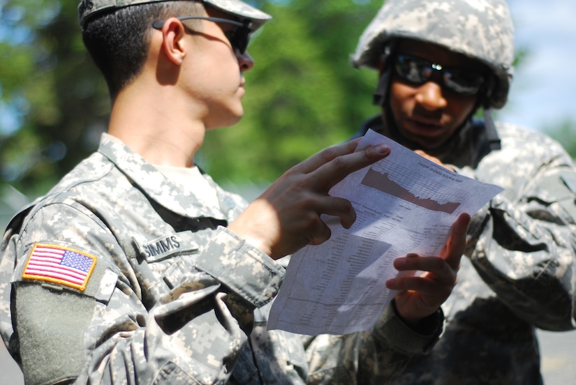 U.S. Army Reserve Spc. Kevin Simms (left) and Cadet Ahmed Baa of Charlie Company, 392nd Expeditionary Signal Battalion, 359th Signal Brigade, 335th Signal Command (Theater), discuss calibration adjustments to signal equipment during the Combat Support Training Exercise (CSTX) 78 at Fort Dix, N.J. on June 13, 2015. The 2015 CSTX presents realistic and challenging scenario-based training for soldiers and units preparing for deployment.