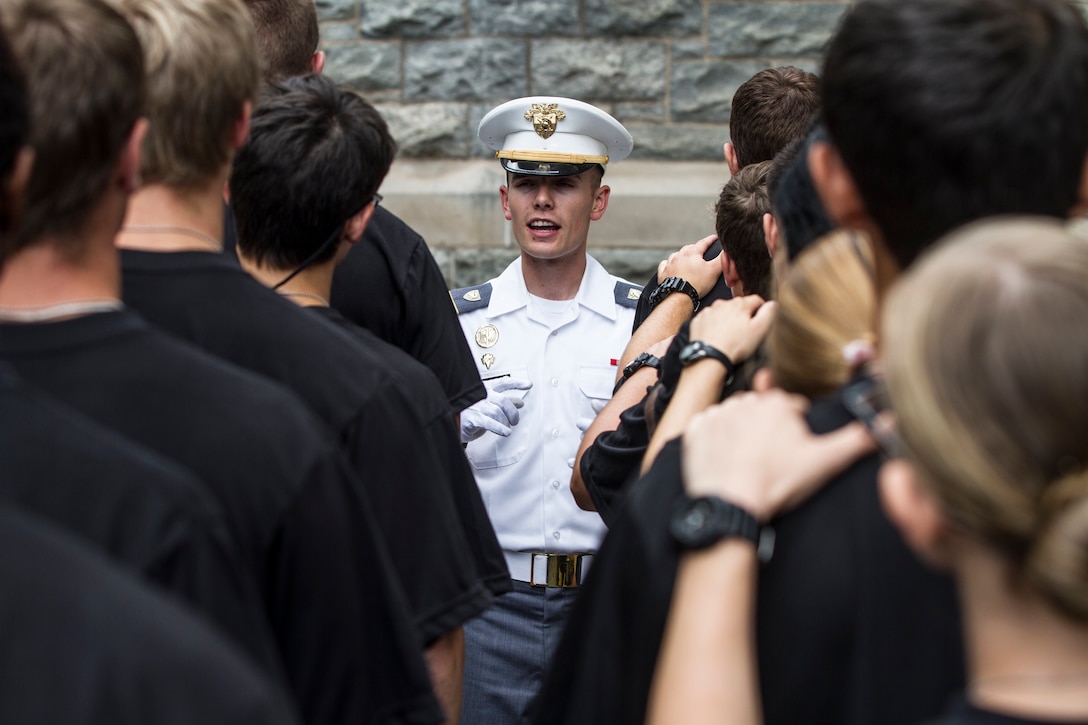 Future cadets reporting to the United States Military Academy at West Point are lined up chow under the watchful eye of a Cow, or cadet in his third year at the Academy, at Thayer Hall on R-day. Almost 1,300 future cadets reported on R-day this year which is typically held on the last Monday of every June. (U.S. Army photo by Sgt. 1st Class Brian Hamilton)