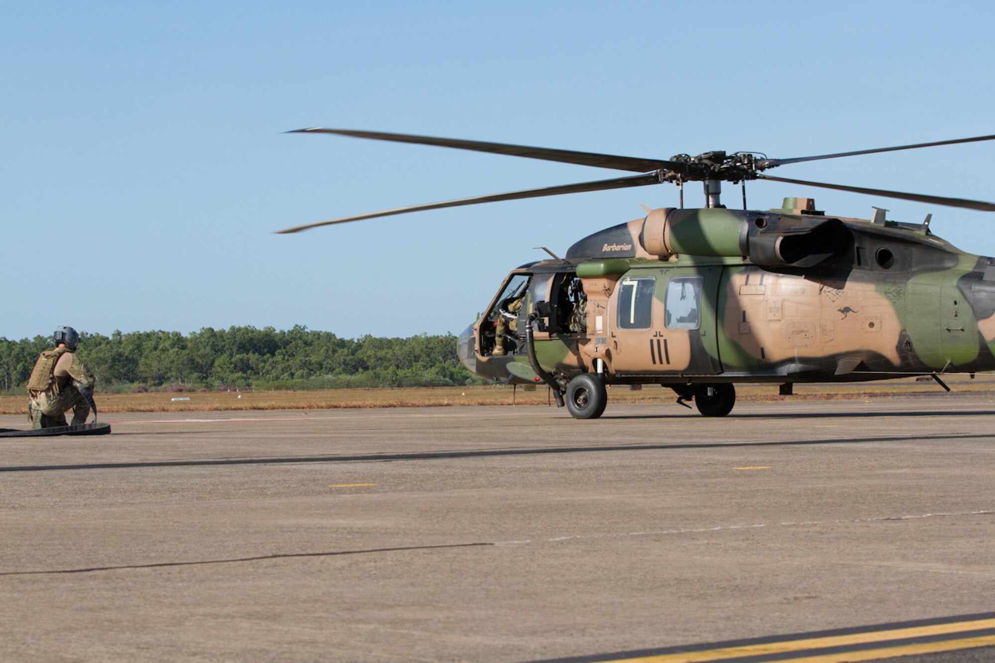 U.S. Air Force Airmen from the 18th Logistics Readiness Squadron from Kadena Air Base, Japan, partnered with the Australian Army during a refueling exercise at the Royal Australian Air Force Base Darwin, July 8, 2015, in Darwin, Australia during Talisman Sabre 2015. Talisman Sabre is a biennial exercise that provides an invaluable opportunity for nearly 30,000 U.S. and Australian defense forces to conduct operations in a combined, joint and interagency environment that will increase both countries’ ability to plan and execute a full range of operations from combat missions to humanitarian assistance efforts. (U.S. Army photo by Sgt. Steven Peterson/Released)