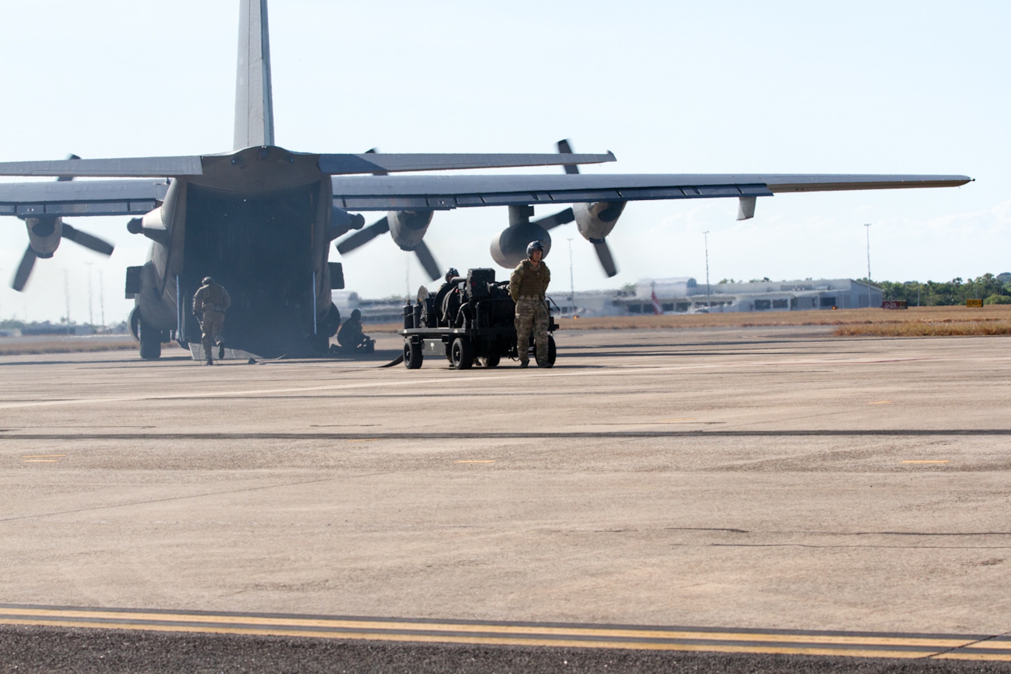 U.S. Air Force Airmen from the 18th Logistics Readiness Squadron from Kadena Air Base, Japan, partnered with the Australian Army during a refueling exercise at the Royal Australian Air Force Base Darwin, July 8, 2015, in Darwin, Australia during Talisman Sabre 2015. Talisman Sabre is a biennial exercise that provides an invaluable opportunity for nearly 30,000 U.S. and Australian defense forces to conduct operations in a combined, joint and interagency environment that will increase both countries’ ability to plan and execute a full range of operations from combat missions to humanitarian assistance efforts. (U.S. Army photo by Sgt. Steven Peterson/Released)