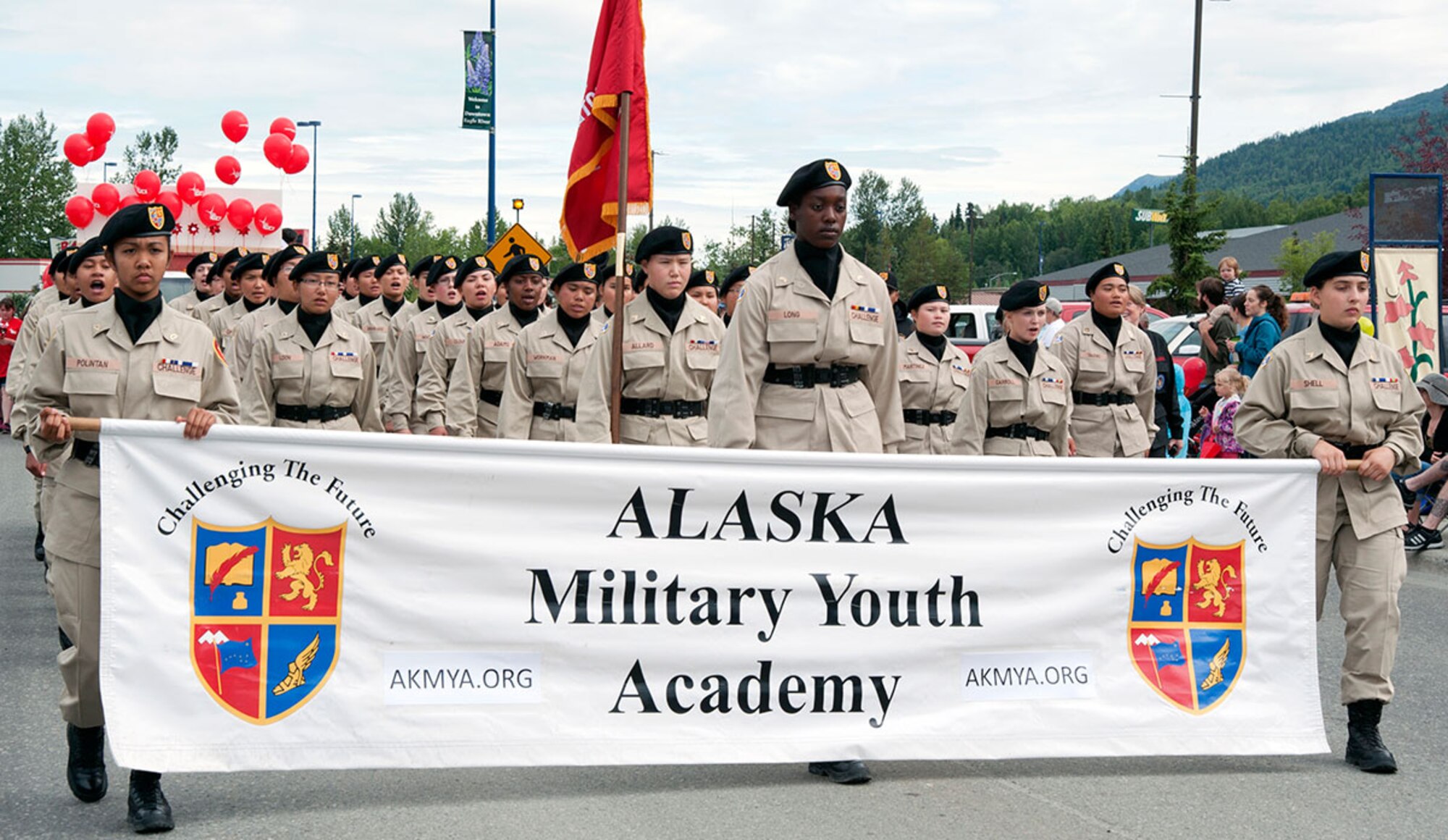 The Alaska Military Youth Academy marches in the annual Bear Paw Parade in Eagle River, Alaska, July 11, 2015. The parade is part of a five-day festival hosted every year by the Eagle River Chamber of Commerce. This year is the 30th annual Bear Paw Festival. (U.S. Air Force photo/Senior Airman Tammie Ramsouer)