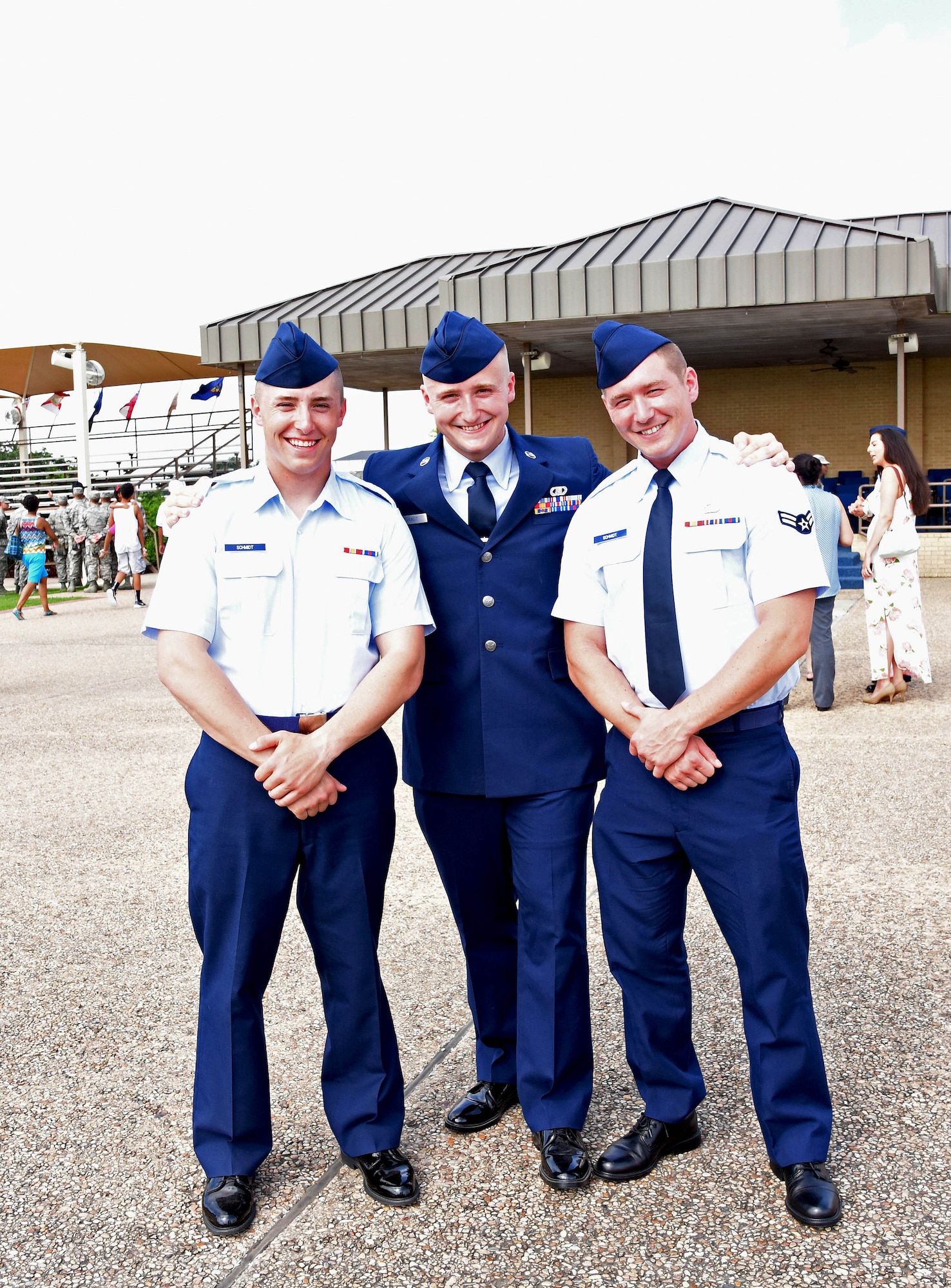 From left to right, Logan, Kendrick and Collin Schmidt pose for a photograph after a graduation ceremony at Joint Base San Antonio, Texas, June 26. Logan was the most recent graduate of Air Force basic training and the final Schmidt brother to join the Air Force. (Courtesy photo Airman 1st Class Collin Schmidt)