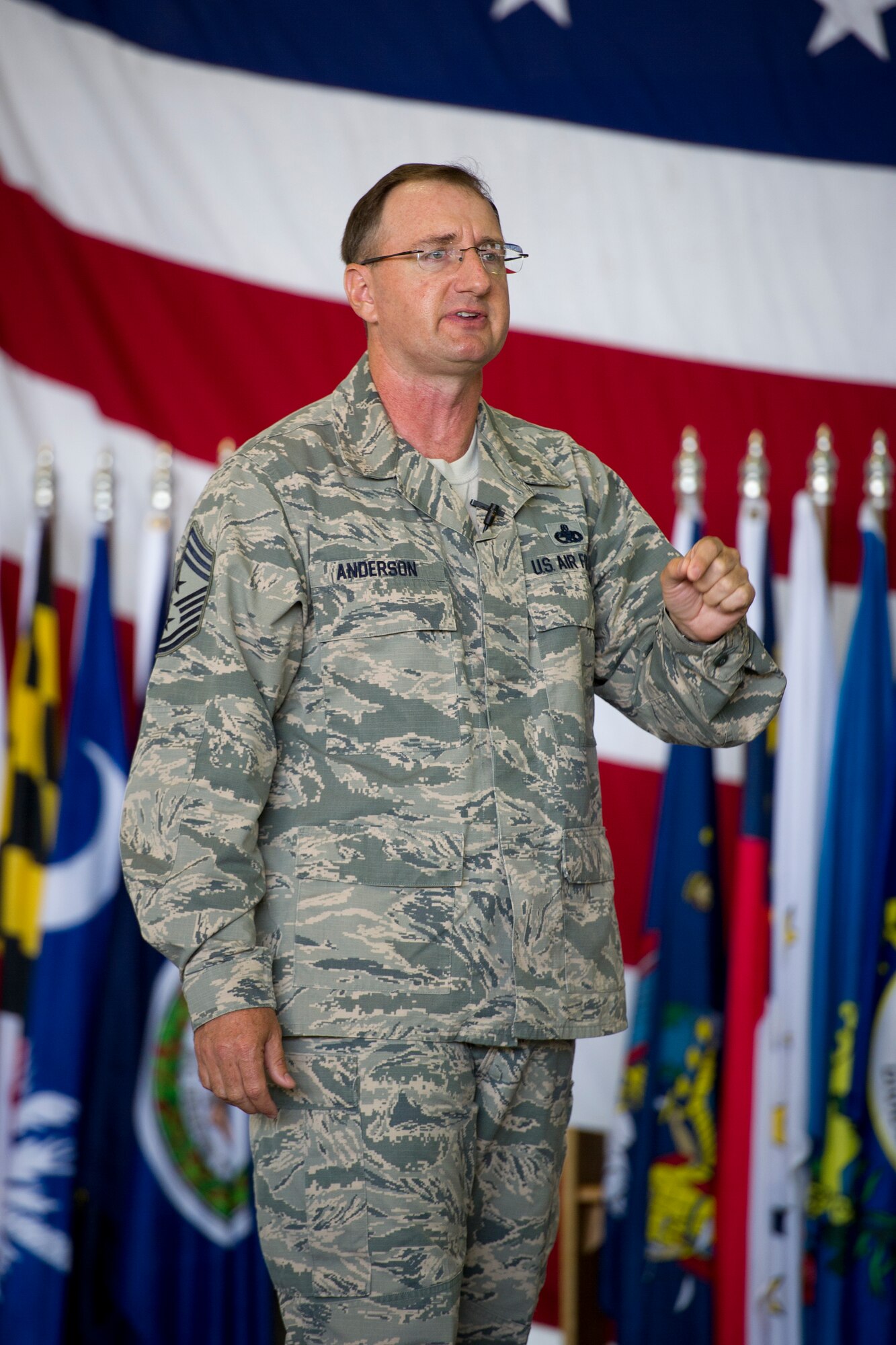 Chief Master Sgt. Marty Anderson, Command Chief Master Sergeant, Eighth Air
Force, speaks to 5th Bomb Wing Airmen at Dock 1 at Minot Air Force Base,
N.D., July 13, 2015.  According to the official Air Force webpage, Eighth
Air Force, or "The Mighty Eighth", serves as the air component headquarters
to U.S. Strategic Command for strategic deterrence and global strike.  (U.S.
Air Force photo/Airman 1st Class Justin T. Armstrong)
