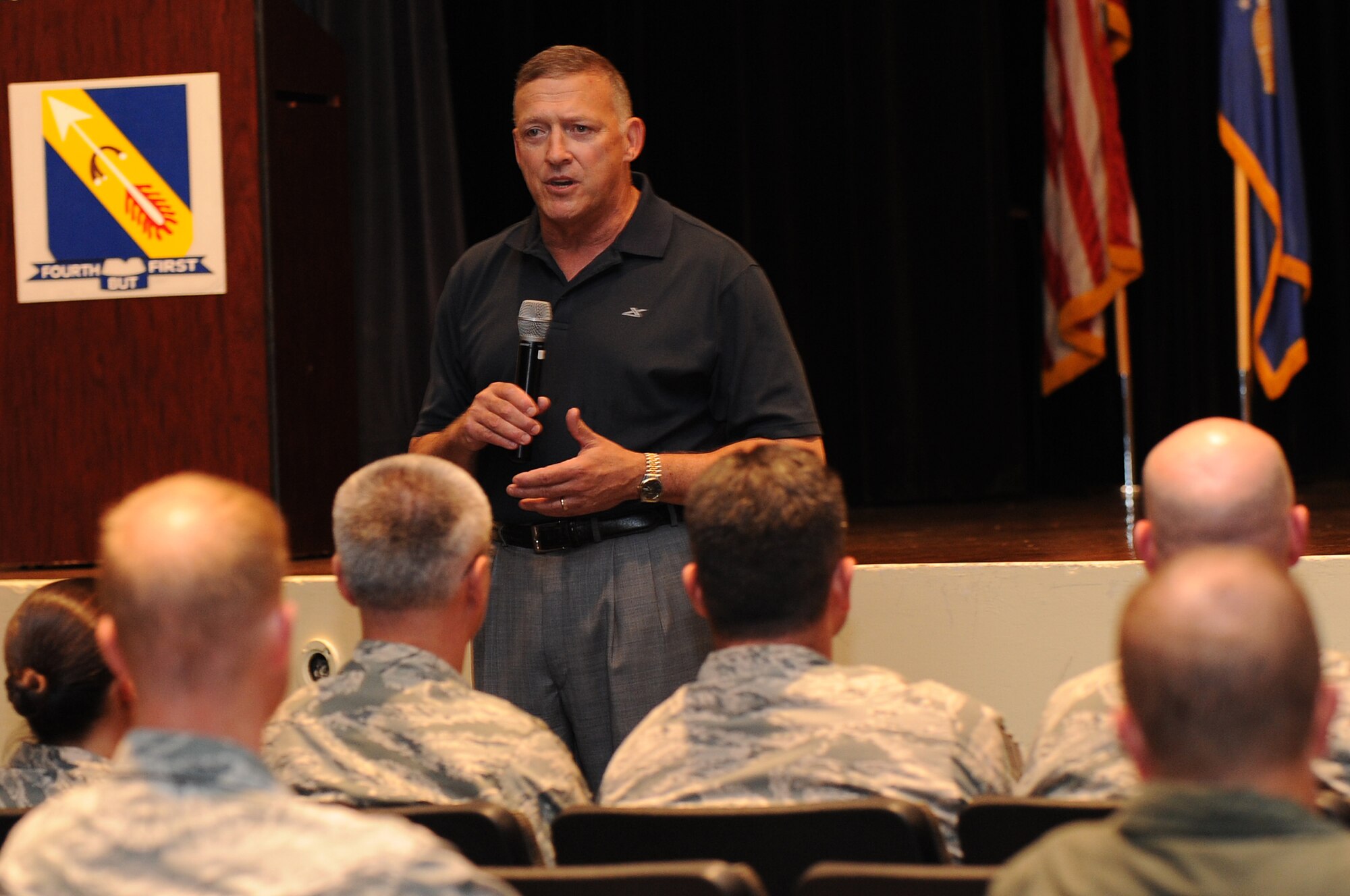 Retired Gen. Gary North addresses members of Team Seymour during a Leadership Lecture Series event, July 9, 2015, at Seymour Johnson Air Force Base, North Carolina. The LLS gives Airmen an opportunity to learn and grow from the experiences of various leaders. (U.S. Air Force photo/Airman 1st Class Ashley Williamson)