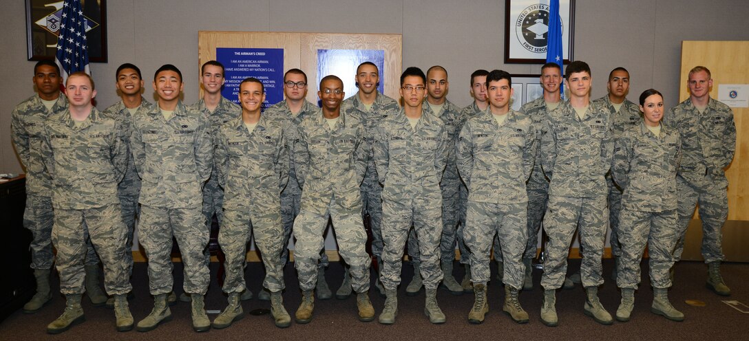 Airmen attending the First Term Airman Center class pose for a photo, July 13, 2015, at McConnell Air Force Base, Kan. The class helps Airmen transition from technical training to the operational Air Force and helps build total force, mission-ready Airmen. (U.S. Air Force photo by Airman 1st Class Christopher Thornbury)