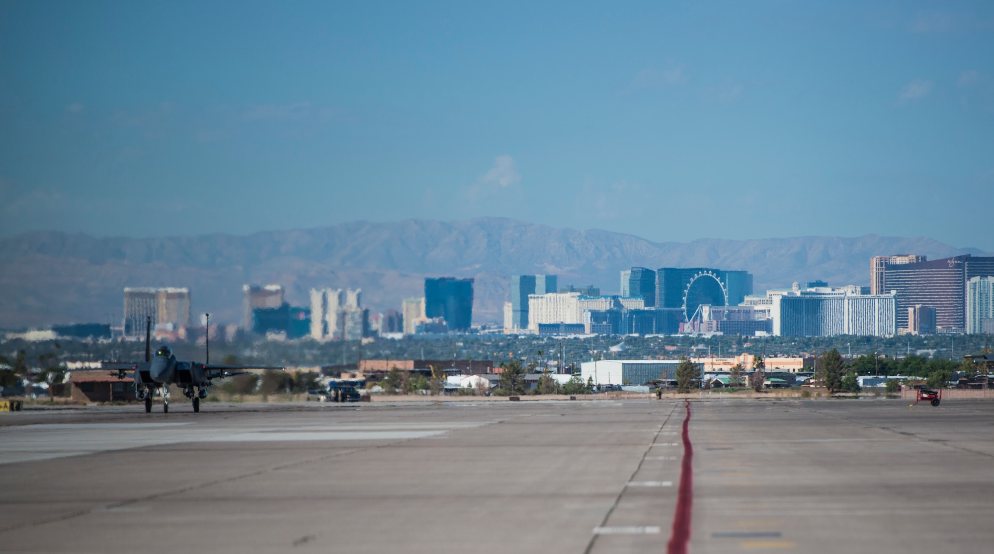 A 391st Fighter Squadron F-15E Strike Eagle taxies on the runway at Nellis Air Force Base, Nev., July 7, 2015. Red Flag 15-3 is a realistic combat training exercise involving the air forces of the United States and its allies. The exercise is conducted on the 15,000-square-mile Nevada Test and Training Range, located north of Las Vegas.(U.S. Air Force photo by Senior Airman Brittany A. Chase)
