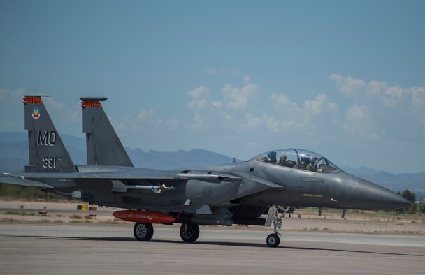The 391st Fighter Squadron flagship F-15E Strike Eagle taxies off the runway at Nellis Air Force Base, Nev., July 7, 2015. Red Flag 15-3 is a realistic combat training exercise involving the air forces of the United States and its allies. The exercise is conducted on the 15,000-square-mile Nevada Test and Training Range, located north of Las Vegas. (U.S. Air Force photo by Senior Airman Brittany A. Chase)