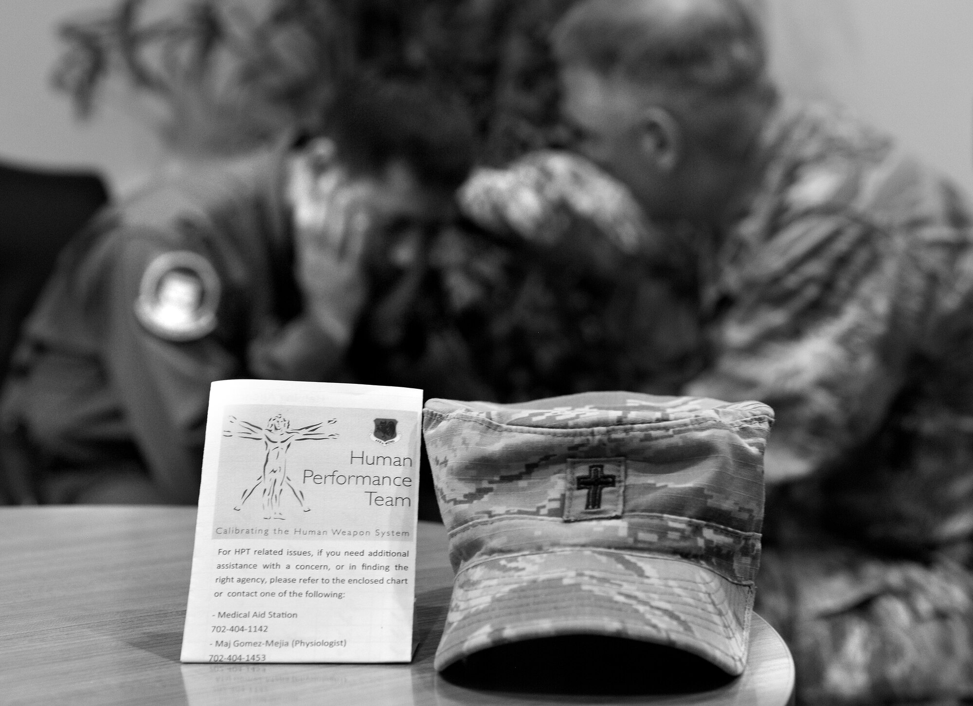 Capt. David, 432nd Wing remotely piloted aircraft pilot, seeks out the chaplain for guidance where he learned about the other services of the human performance team. The HPT is unique to Creech Air Force Base, Nevada, and is comprised of the chaplain corps, operational psychologist, operational physiologist, and flight medicine doctor and aims to help Airmen in the spiritual, psychological, physical, emotional, and intellectual areas of wellness. (U.S. Air Force photo by Airman 1st Class Christian Clausen/Released)