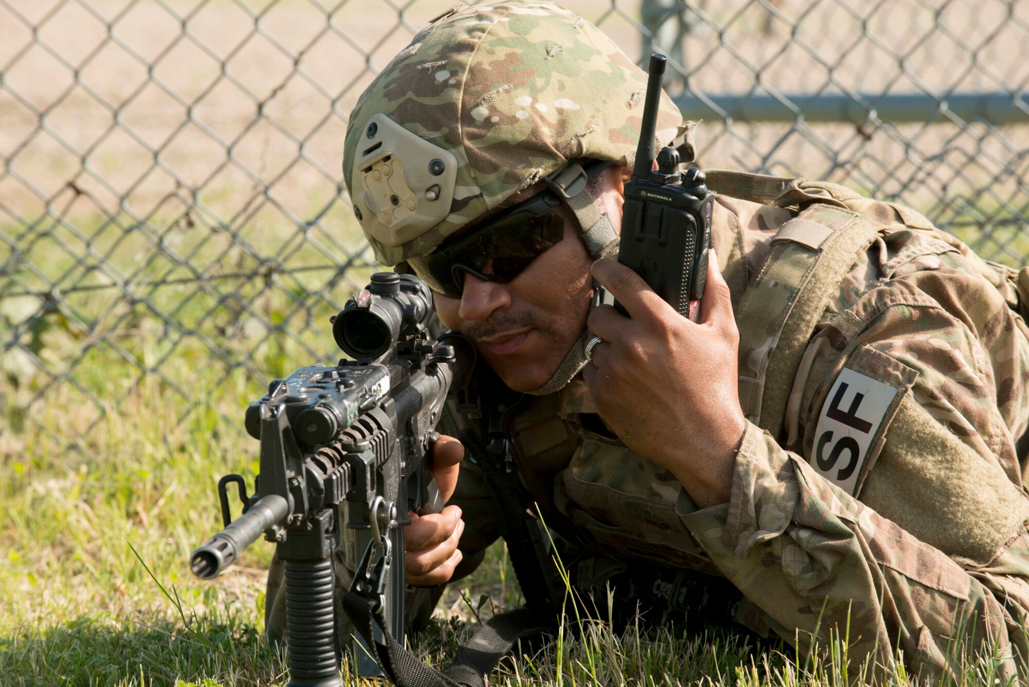 A 91st Security Forces Group member guards a launch facility during an exercise near Donnybrook, N.D., June 29, 2015. Airmen from 219th Security Forces Squadron and 791st Missile Security Forces Squadron worked together to pacify personnel dressed as simulated aggressors and recapture a launch facility. (U.S. Air Force photo/Airman 1st Class Sahara L. Fales)