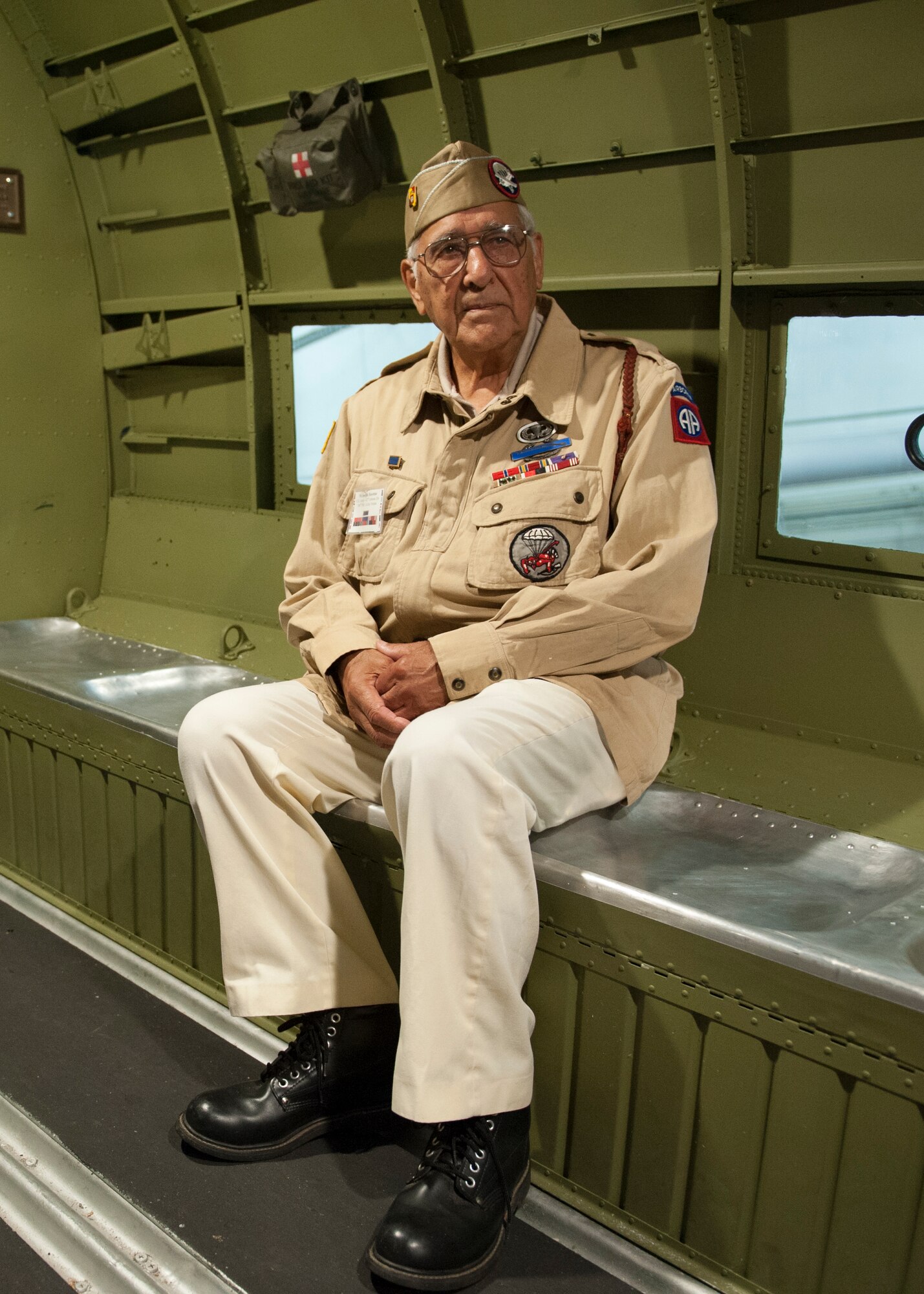 Joe Morettini sits inside a C-47A Skytrain July 9, 2015, at the Air Mobility Command Museum on Dover Air Force Base, Del. Morettini, now 90 years old, jumped out of this very C-47 on D-Day, June 6, 1944, over Sainte-Mère-Église, France. (U.S. Air Force photo/Airman 1st Class Zachary Cacicia)