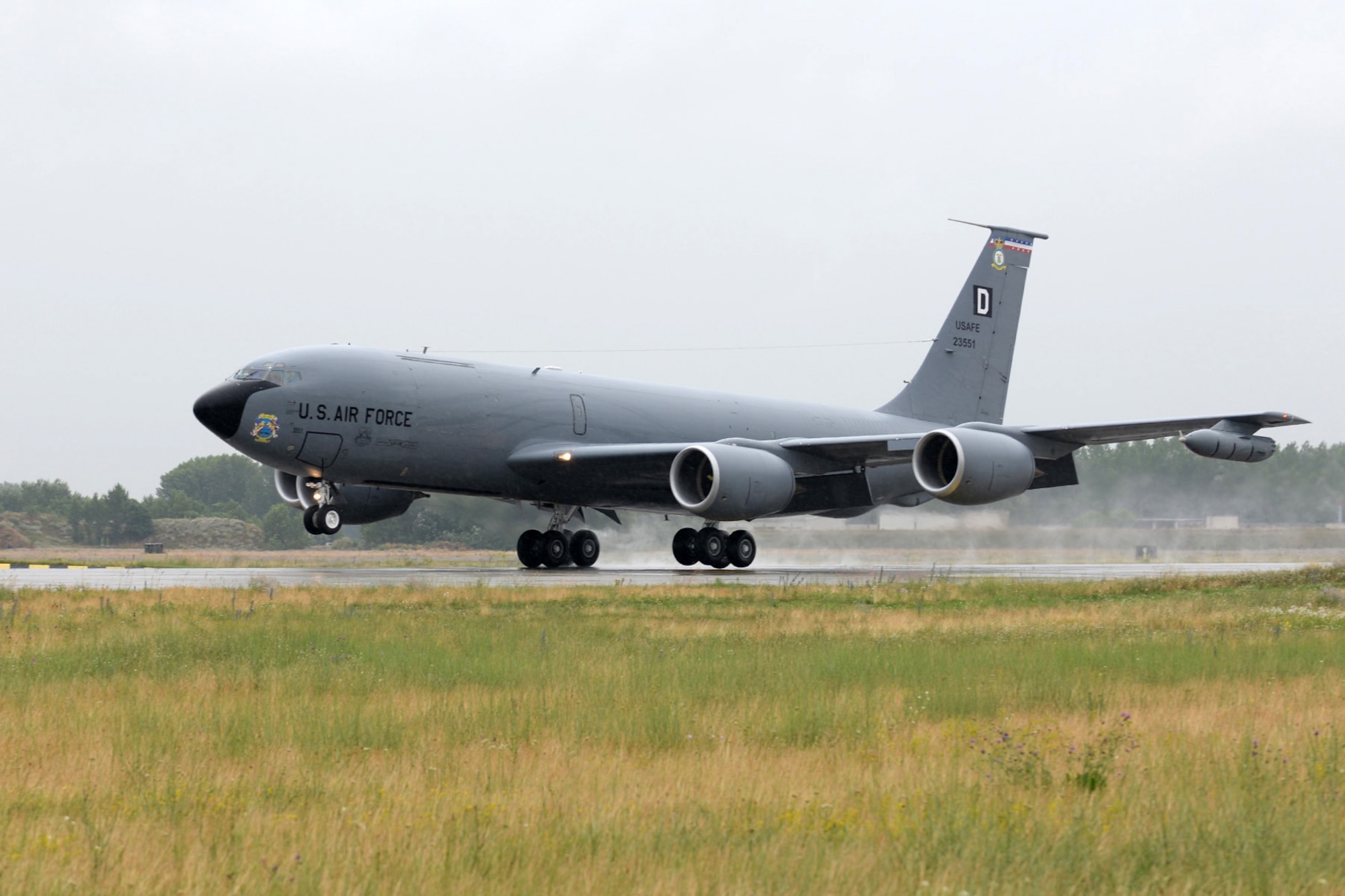 A U.S. Air Force KC-135 Stratotanker lands June 24, 2015, during air refueling familiarization training on Kecskemét air base, Hungary. Hungarian, U.S. and Swedish air force personnel met for a two-week familiarization period enabling the Hungarian JAS-39 Gripen pilots to successfully perform air refueling for the first time. (U.S. Air Force photo by Senior Airman Kate Thornton/Released)