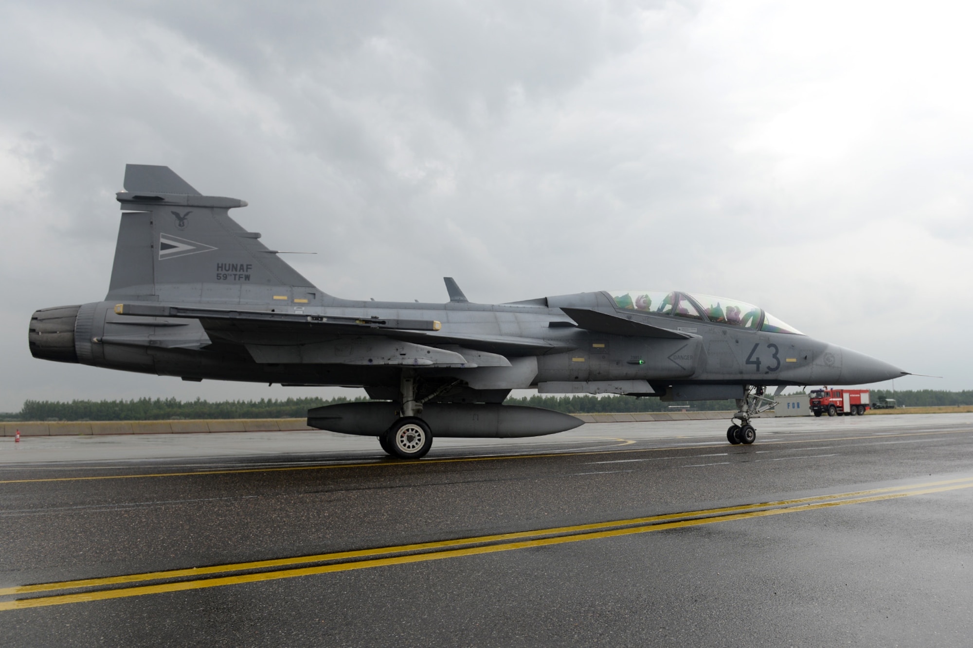 A Hungarian air force JAS-39 Gripen taxis for take-off June 24, 2015, during air refueling familiarization training on Kecskemét air base, Hungary. Hungarian, U.S. and Swedish air force personnel met for a two-week familiarization period enabling the Hungarian JAS-39 Gripen pilots to successfully perform air refueling for the first time. (U.S. Air Force photo by Senior Airman Kate Thornton/Released)