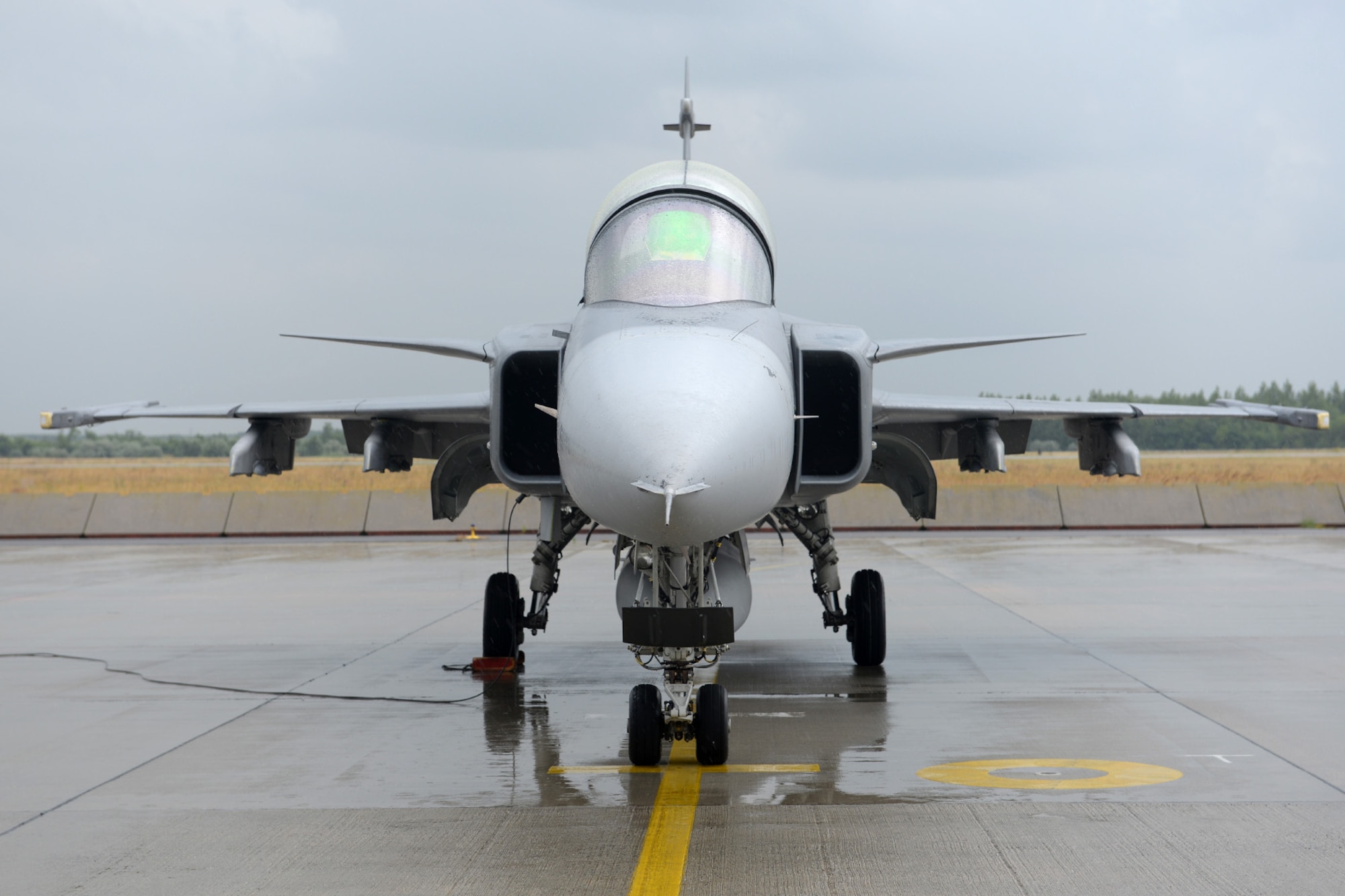 A Hungarian air force JAS-39 Gripen prepares to taxi June 24, 2015, during air refueling familiarization training on Kecskemét air base, Hungary. Hungarian, U.S. and Swedish air force personnel met for a two-week familiarization period enabling the Hungarian JAS-39 Gripen pilots to successfully perform air refueling for the first time. (U.S. Air Force photo by Senior Airman Kate Thornton/Released)