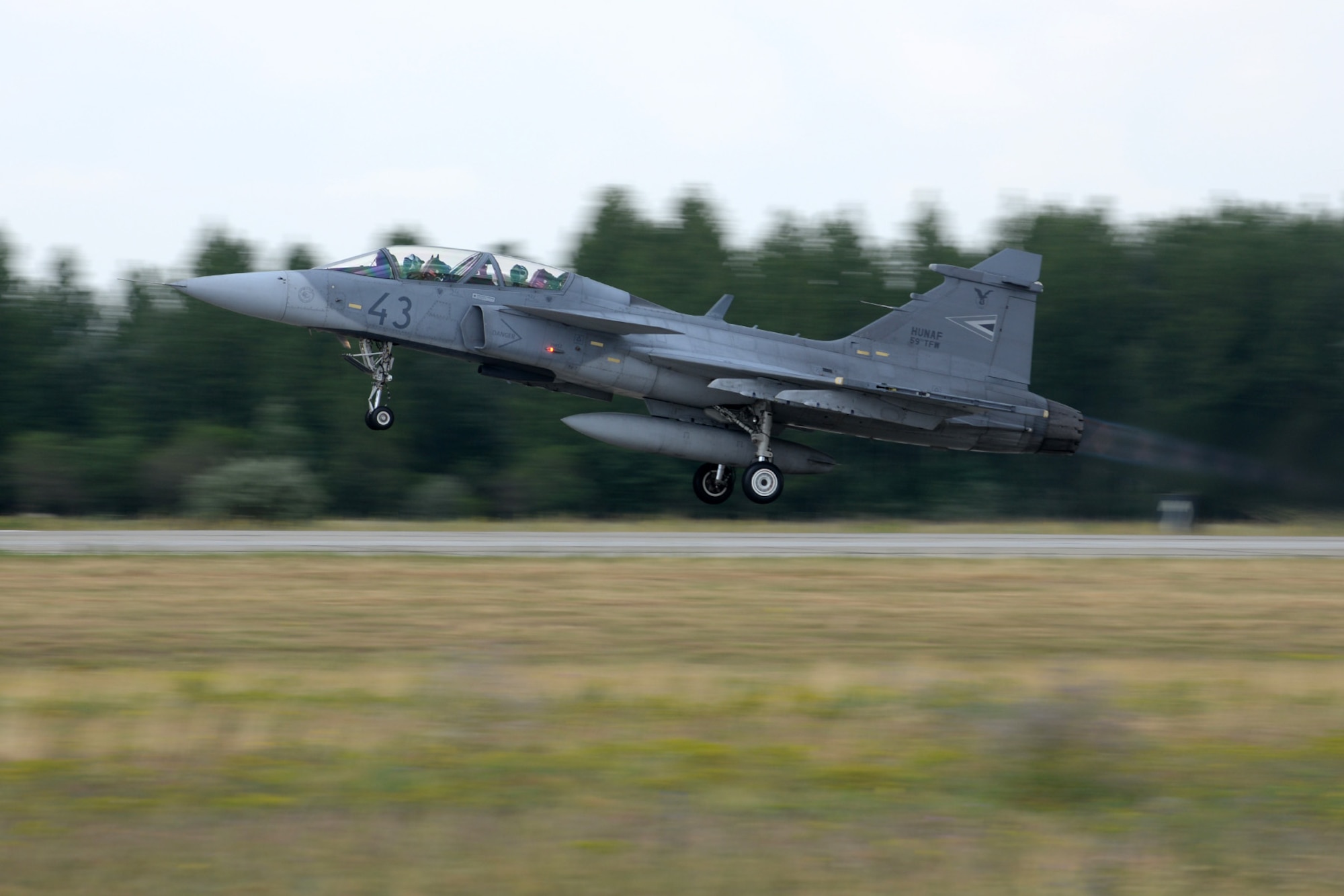 A JAS-39 Gripen takes off June 24, 2015, during air refueling familiarization training on Kecskemét air base, Hungary. Hungarian, U.S. and Swedish air force personnel met for a two-week familiarization period enabling the Hungarian JAS-39 Gripen pilots to successfully perform air refueling for the first time. (U.S. Air Force photo by Senior Airman Kate Thornton/Released)
