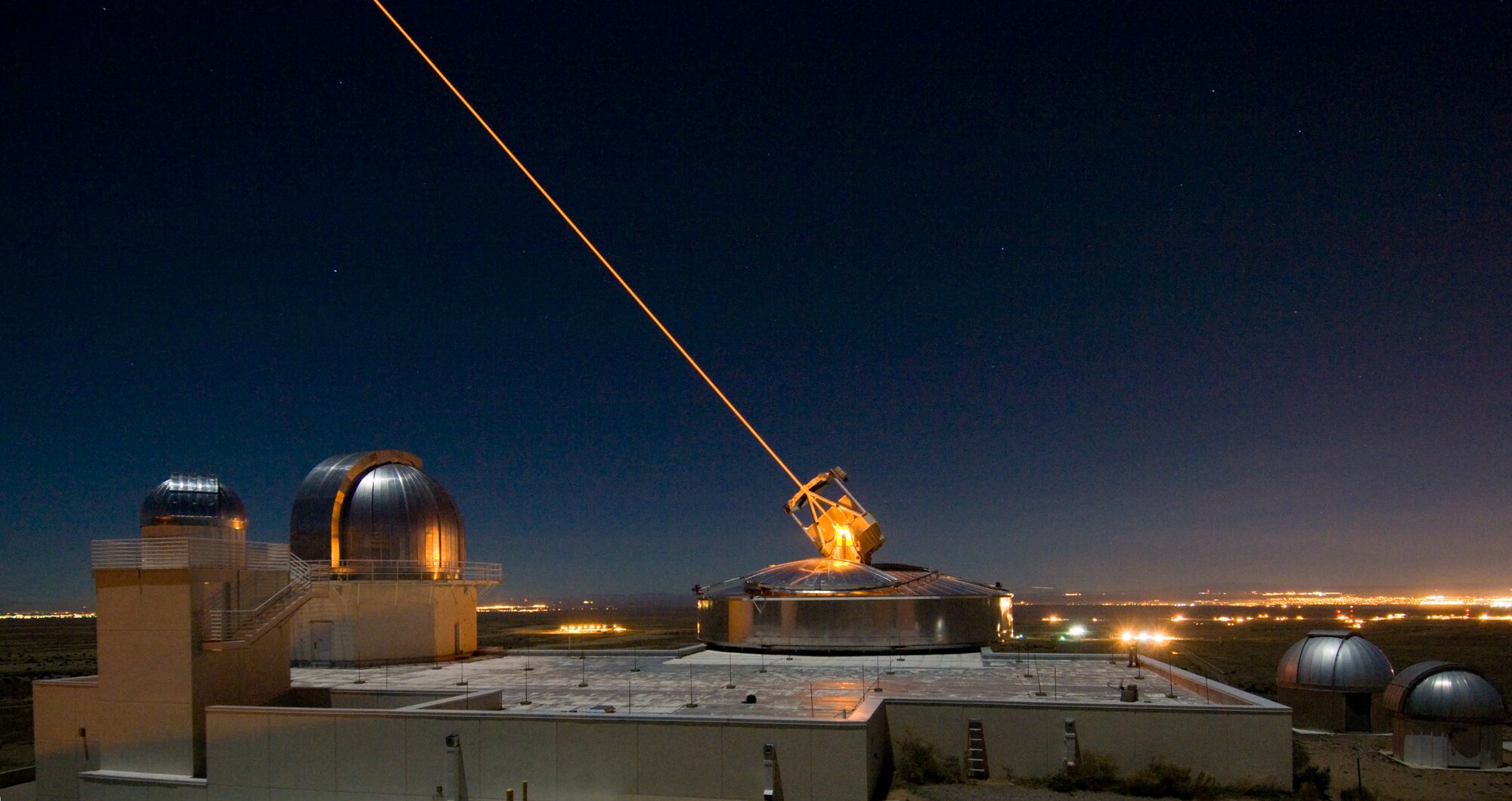 The Sodium Guidestar at the Air Force Research Laboratory Directed Energy Directorate's Starfire Optical Range. Researchers with AFRL use the Guidestar  laser for real-time, high-fidelity tracking and imaging of satellites too faint for conventional adaptive optical imaging systems.The SOR's world-class adaptive optics telescope is the second largest telescope in the Department of Defense.  (Courtesy photo)