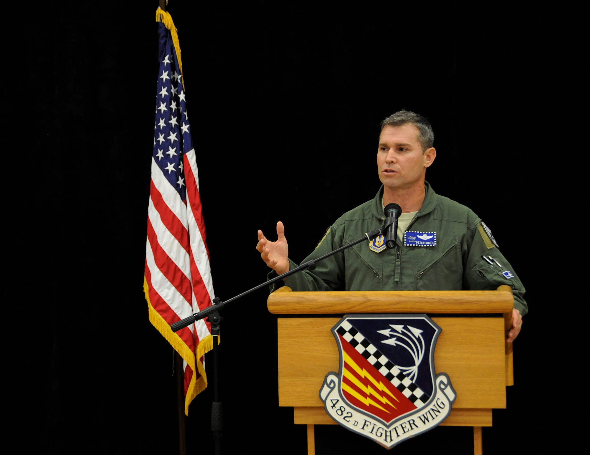 Lt. Col. Peter Smith, 482nd Fighter Wing Safety Office chief, explains
summer safety tips to those gathered for the Commander's Call on Sunday,
July 12. The Safety Office is located in building 360 next to the command
post and can be reached at 786-415-7333. (U. S. Air Force photo/Senior Airman Nicholas Caceres)
