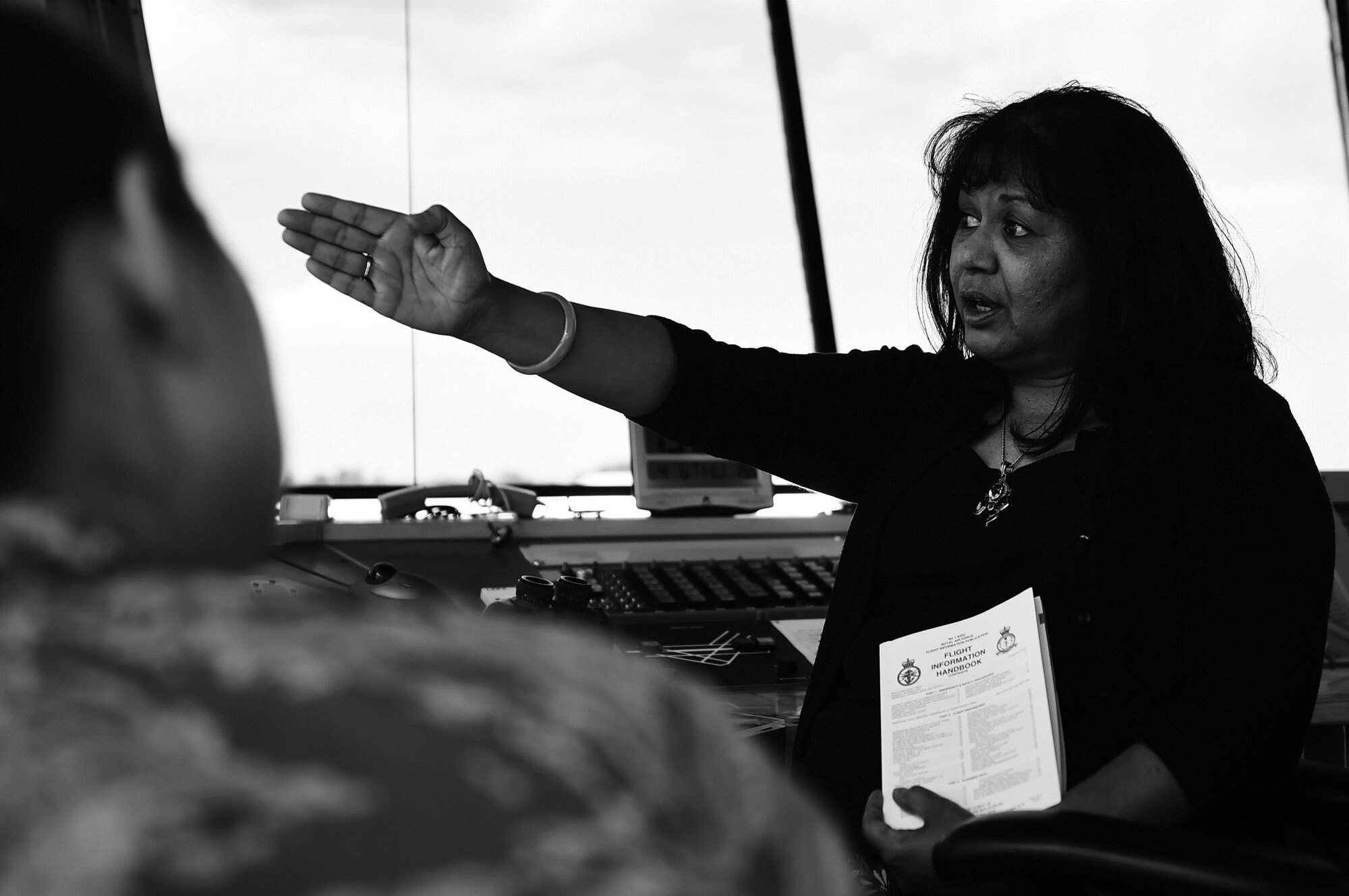 Zelda Montoya, 422nd Air Base Group air traffic manager, illustrates what she calls “a map in the sky” to Airmen during a training exercise at RAF Fairford, United Kingdom, June 4, 2015. From her years of experience, Montoya said she is able to effectively multi-task air operations into several primary and contingency plans. (U.S. Air Force photo by Tech. Sgt. Chrissy Best/Released)