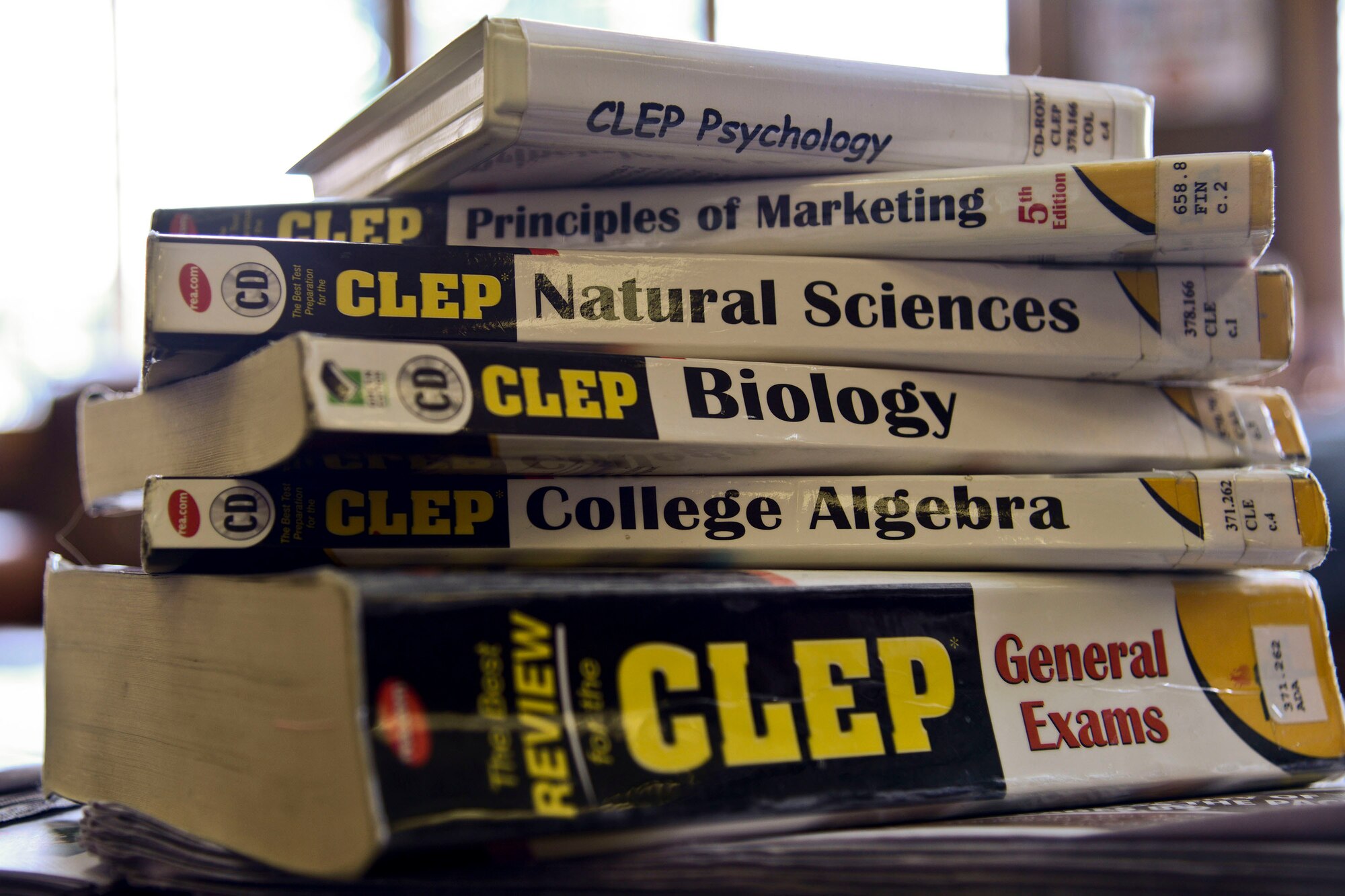 Various College Level Examination Program and Defense Activity for Non-Traditional Education Support study materials are located in the base library on Osan Air Base, Republic of Korea on July 2, 2015. Depending on the subject, between three and 12 credit hours can be earned for CLEP and DANTES testing, saving weeks of class time. (U.S. Air Force photo/Senior Airman Kristin High)