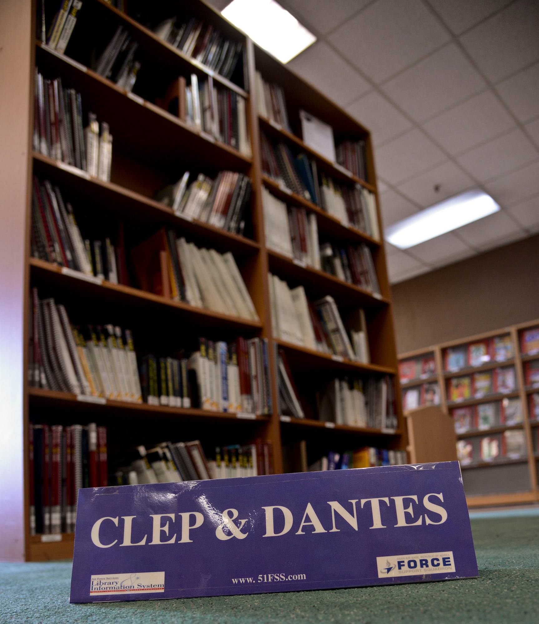 Hundreds of various study materials for College Level Examination Program and Defense Activity for Non-Traditional Education Support testing are located in the base library on Osan Air Base, Republic of Korea on July 2, 2015. CLEP and DANTES tests are used to assess college-level knowledge in various subject areas and provide a mechanism for earning college credits without taking college courses. This can save weeks of class time for those on the fast track of their degree plans. (U.S. Air Force photo/Senior Airman Kristin High)