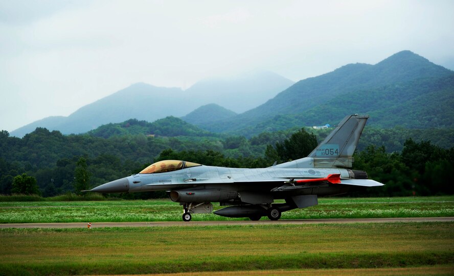 A KF-16 Fighting Falcon from the 19th Fighter Wing taxis to the runway at Jungwon Air Base, Republic of Korea, during Buddy Wing 15-6, July 8, 2015. In an effort to enhance U.S. and ROKAF air combat capability, Buddy Wing exercises are conducted multiple times throughout the year on the peninsula to sharpen interoperability between the allied forces so that if need be, they are always ready to fight as a combined force. (U.S. Air Force photo by Staff Sgt. Nick Wilson/Released)