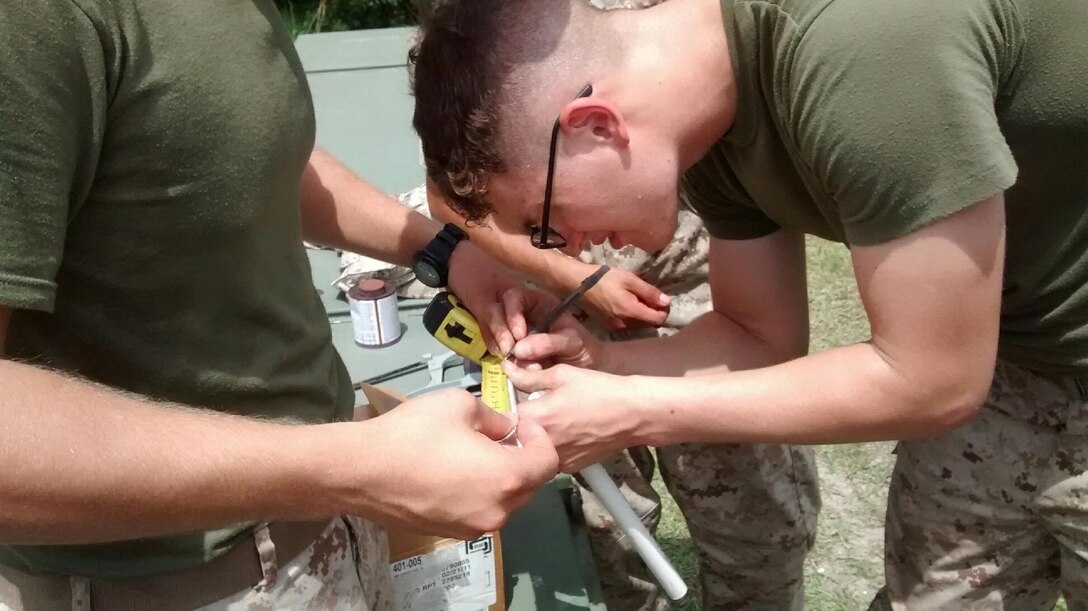 Marines from BWST 6-15 conduct a practical application on plumbing.