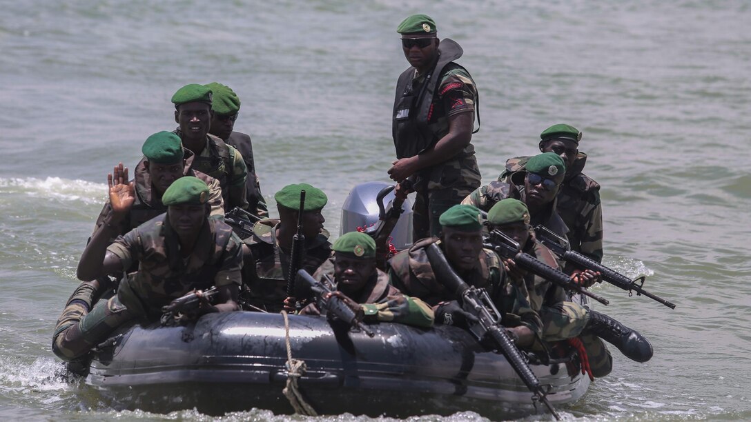 Senegalese Compagnie Fusilier de Marin Commandos navigate toward the shore on a zodiac during a final exercise alongside U.S. personnel with Special-Purpose Marine Air-Ground Task Force Crisis Response-Africa in St. Louis, Senegal, July 8, 2015. The exercise concluded a nearly six-week training evolution between U.S. Marines, sailors and coast guardsmen and the Senegalese. The training focused on small-boat operations and infantry skills taught to more than 30 members of the Fusilier Marins.