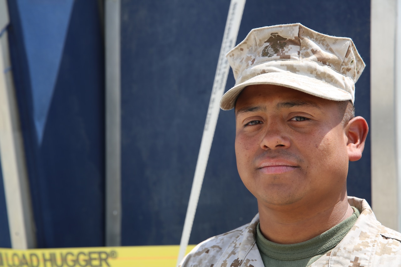 U.S. Marine Corps Sgt. Edwin Maldonado, warehouse chief with Special Purpose Marine Air-Ground Task Force Crisis Response- Central Command, facilitates logistics in Southwest Asia, July 11, 2015. U.S. Marine Corps photo by Lance Cpl. Garrett White