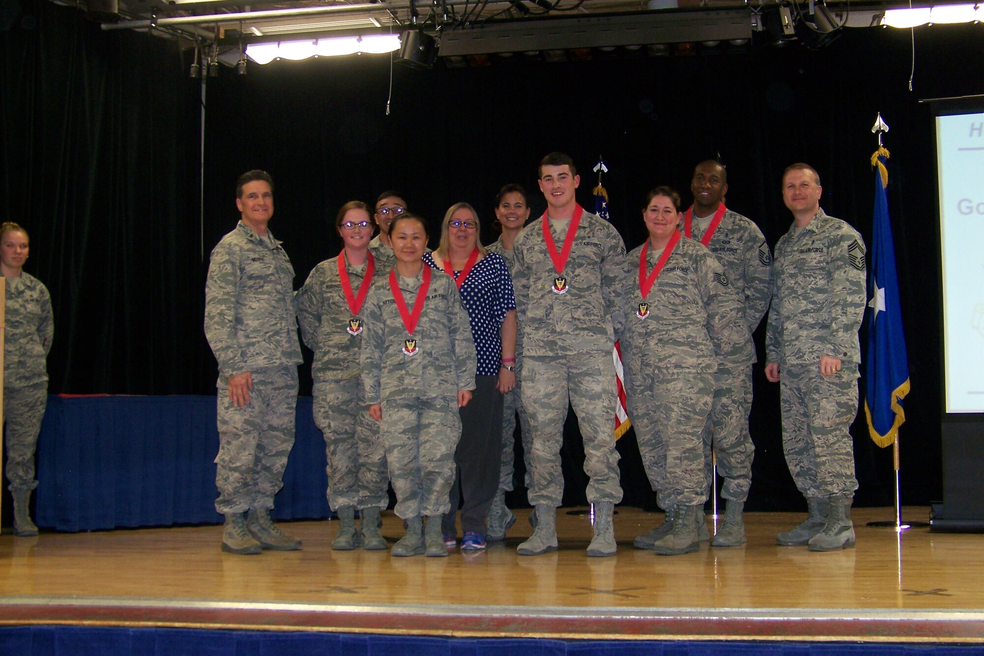 Brig. Gen. (Dr.) Sean Murphy, command surgeon at the Air Combat Command, and Chief Master Sgt. Michael Wood, ACC chief of medical enlisted force, toured Holloman Air Force Base, New Mexico, April 7-8, 2015 to see how the 49th Medical Group  supports the training mission here.

Gen. Murphy and Chief Wood met with the medics at the 49th MDG to understand their day- to-day operations and roles in supporting the ACC and Air Force Medical Service mission.

Gen. Murphy discussed the AFMS strategic plan with the group and briefly explained where we are heading. He discussed key issues such as patient safety, mentorship and service member retention. Gen. Murphy also focused heavily on building a system of trust. He echoed the AFMS mantra, "trusted care anywhere," stating how we need to trust each other and deliver the best care for the best value to our patients ... If there is no trust, we don't have anything. He also shared stories and examples to show the importance of giving people chances and never giving up. "Ask yourself and ask people what makes them happy. Find your happiness, because if you are not happy then you won't be able to give your 100 percent," said Murphy.

The ACC command surgeon honed in on the value and importance of High Reliability Organizations (HRO), emphasizing lean principles, Six Sigma, and building a culture of safety. An HRO provides high quality, safe and effective healthcare for every patient, every time. He asked everyone to think "lean," seeking out waste and getting rid of errors. He asked the audience to be proactive, not reactive, and have the confidence and courage to do the right thing. He acknowledged the manning challenges AF-wide and said, "We are going to have to figure out how to do less with less, but we have to ensure that you communicate the manning shortage impact to the leadership and explain how it's impacting your job. The magic doesn't happen at AFMOA or ACC, it happens here and you make it happen."

While addre