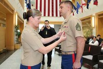 Navy and Marine Corps Medal was SSgt Michael A. Pickett for his heroic actions on 6 July 2013 when he risked his life to save a struggling 9 year old boy caught in a riptide off a beach in North Carolina.  The award was presented by LtCol Heather J. Cotoia and 1stSgt Weslie B. Jackson.