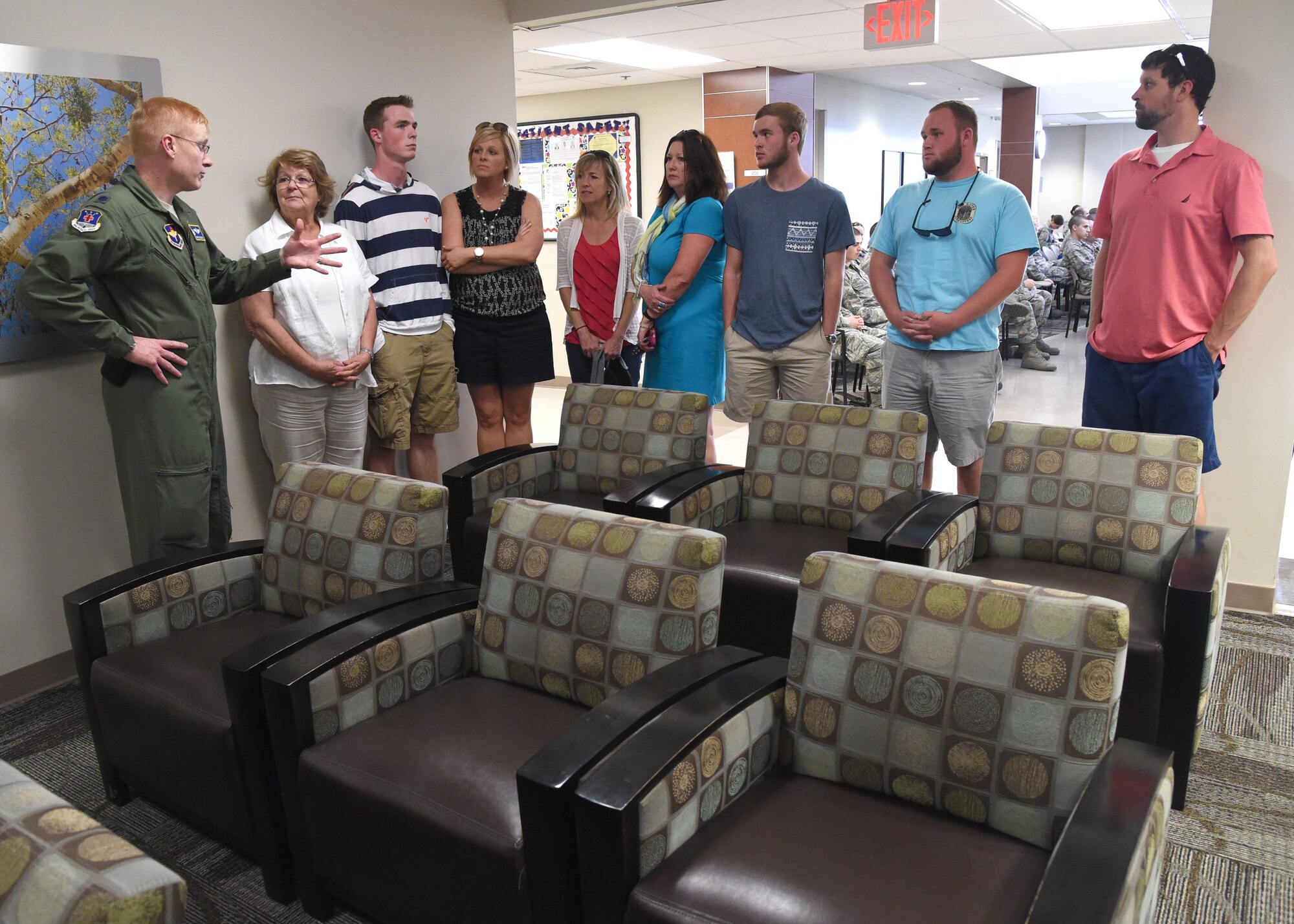 Lt. Col. Christopher Hudson, 559th Aerospace Medicine Squadron commander, explains the 559th Medical Group mission to the Reid family at the Reid Health Services Center May 14, 2015 on Joint Base San Antonio-Lackland, Texas. The Reid clinic was named in honor of Senior Master Sgt. David B. Reid, a former first sergeant who was killed in a C-130 plane crash in 1985. (U.S. Air Force photo/Staff Sgt. Chelsea Browning)