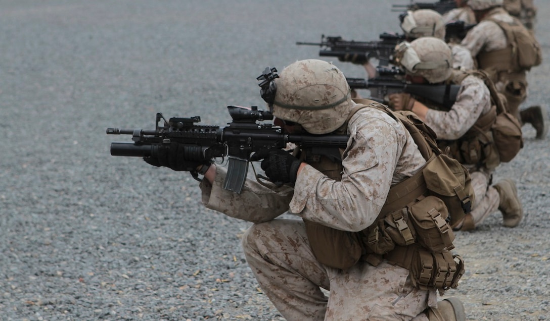 Marines with 2nd Battalion, 1st Marine Division, I Marine Expeditionary Force, sight in on their targets during Special Operations Training Group’s Raid Leaders Course aboard Marine Corps Base Camp Pendleton, Calif., June 9, 2015. The two-week long course focuses on preparing Marines to successfully conduct combat raids. (Photo by LCpl. Danielle Rodrigues/Released)