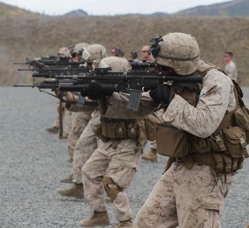 Marines with 2nd Battalion, 1st Marine Division, I Marine Expeditionary Force, sight in on their targets during Special Operations Training Group’s Raid Leaders Course aboard Marine Corps Base Camp Pendleton, Calif., June 9, 2015. The two-week long course focuses on preparing Marines to successfully conduct combat raids. (Photo by LCpl. Danielle Rodrigues/Released)