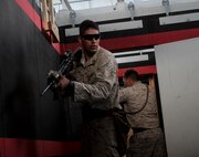 Marines with 2nd Battalion, 1st Marine Division, I Marine Expeditionary Force, practice dry run raids in a simulated combat town during Special Operations Training Group’s Raid Leaders Course aboard Marine Corps Base Camp Pendleton, Calif., June 10, 2015. The two-week long course focuses on preparing Marines to successfully conduct combat raids. (Photo by LCpl. Danielle Rodrigues/Released)