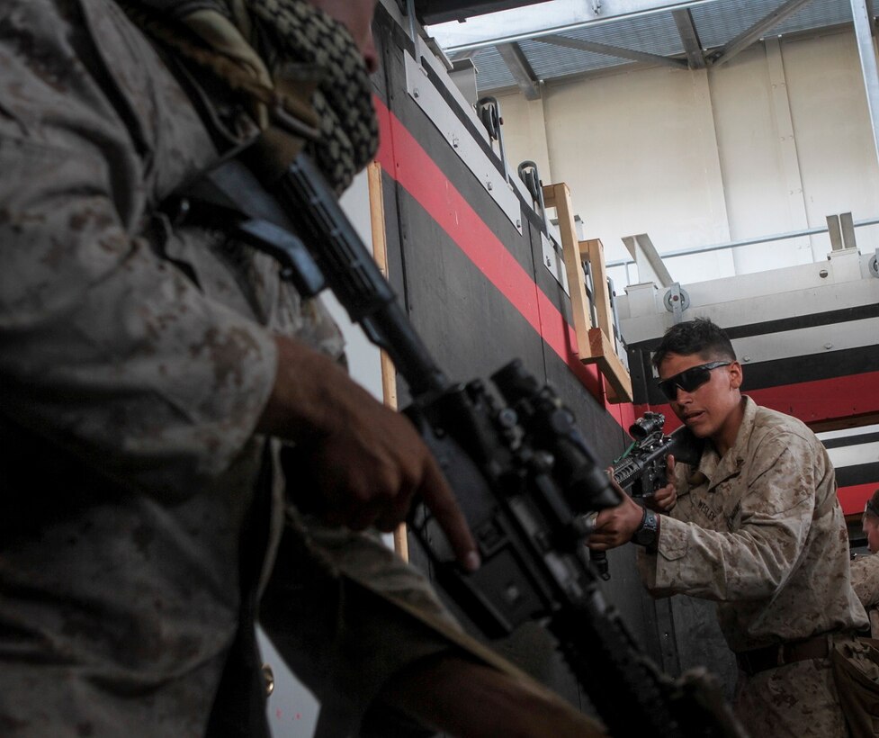 Marines with 2nd Battalion, 1st Marine Division, I Marine Expeditionary Force, practice dry run raids in a simulated combat town during Special Operations Training Group’s Raid Leaders Course aboard Marine Corps Base Camp Pendleton, Calif., June 10, 2015. The two-week long course focuses on preparing Marines to successfully conduct combat raids. (Photo by LCpl. Danielle Rodrigues/Released)