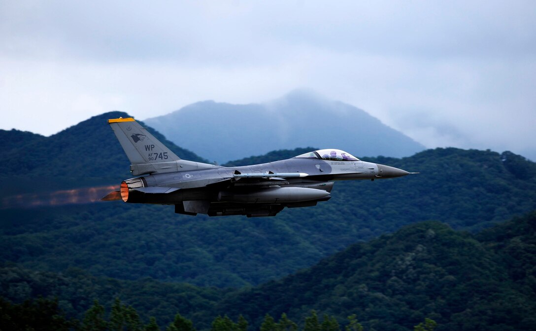 An F-16 Fighting Falcon from the 80th Fighter Squadron at Kunsan Air Base, South Korea, takes off at Jungwon AB, South Korea, during Buddy Wing 15-6, July 8, 2015. Buddy Wing exercises are conducted multiple times throughout the year to sharpen interoperability between U.S. and South Korean forces so, if the need arises, they are always ready to fight as a combined force. (U.S. Air Force photo/Staff Sgt. Nick Wilson)