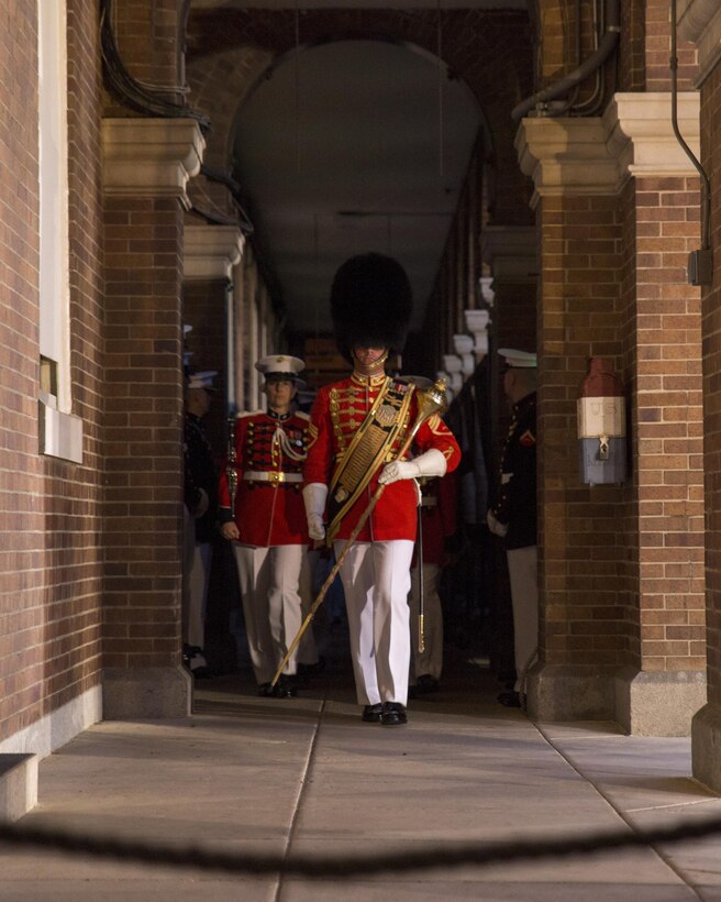 The U.S. Marine Corps Band conducts the opening performance of the Friday Evening Parade at Marine Barracks Washington, D.C., July 10, 2015. Gen. Joseph Dunford Jr., commandant of the Marine Corps, was the hosting official for the July 10 Evening Parade, and the Guests of Honor were eight congressional Marines, to include Sen. Charles Roberts, Sen. Daniel Sullivan, Rep. John Kline, Rep. Michael Coffman, Rep. Scott Rigell, Rep. Paul Cook, Rep. Mike Bost and Rep. Ruben Gallego. (Official Marine Corps photo by Cpl. Chi Nguyen/Released)