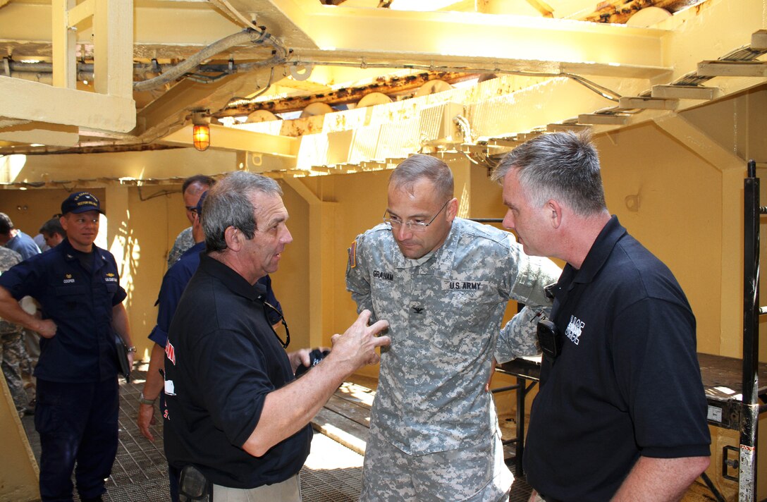 Dredge McFarland Capt. Karl Van Florcke and Assistant Master Mike Hass led a tour of the vessel for COL William H. Graham, commander of the U.S. Army Corps of Engineers' North Atlantic Division, during a visit June 30, 2015. 