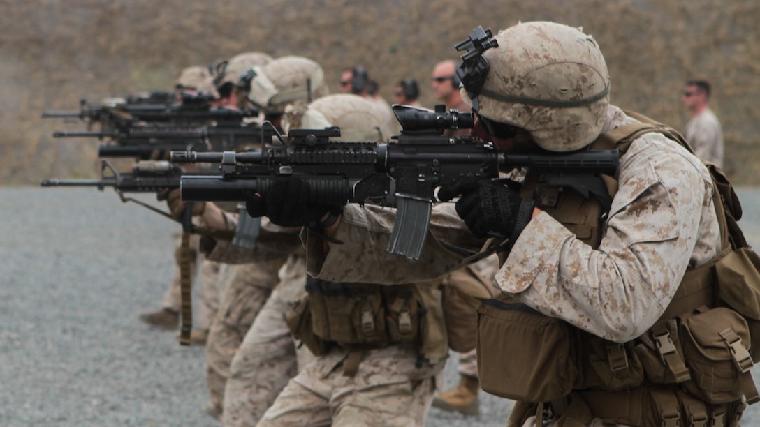 Marines with 2nd Battalion, 1st Marine Division, I Marine Expeditionary Force, sight in on their targets during Special Operations Training Group’s Raid Leaders Course at Marine Corps Base Camp Pendleton, California, June 9, 2015. The two-week long course focuses on preparing Marines to successfully conduct combat raids. 