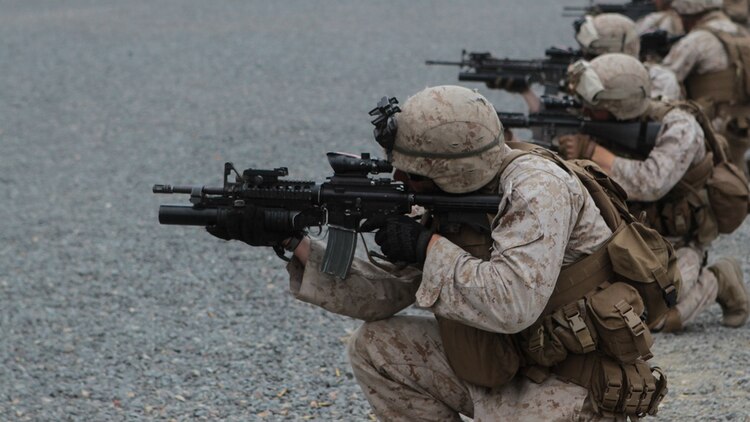 Marines with 2nd Battalion, 1st Marine Division, I Marine Expeditionary Force, sight in on their targets during Special Operations Training Group’s Raid Leaders Course at Marine Corps Base Camp Pendleton, California, June 9, 2015. The two-week long course focuses on preparing Marines to successfully conduct combat raids. 