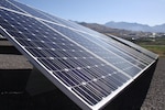 Solar panels on recently completed solar array south of Camp Williams garrison.  View is eastward with Lehi/Alpine in background.