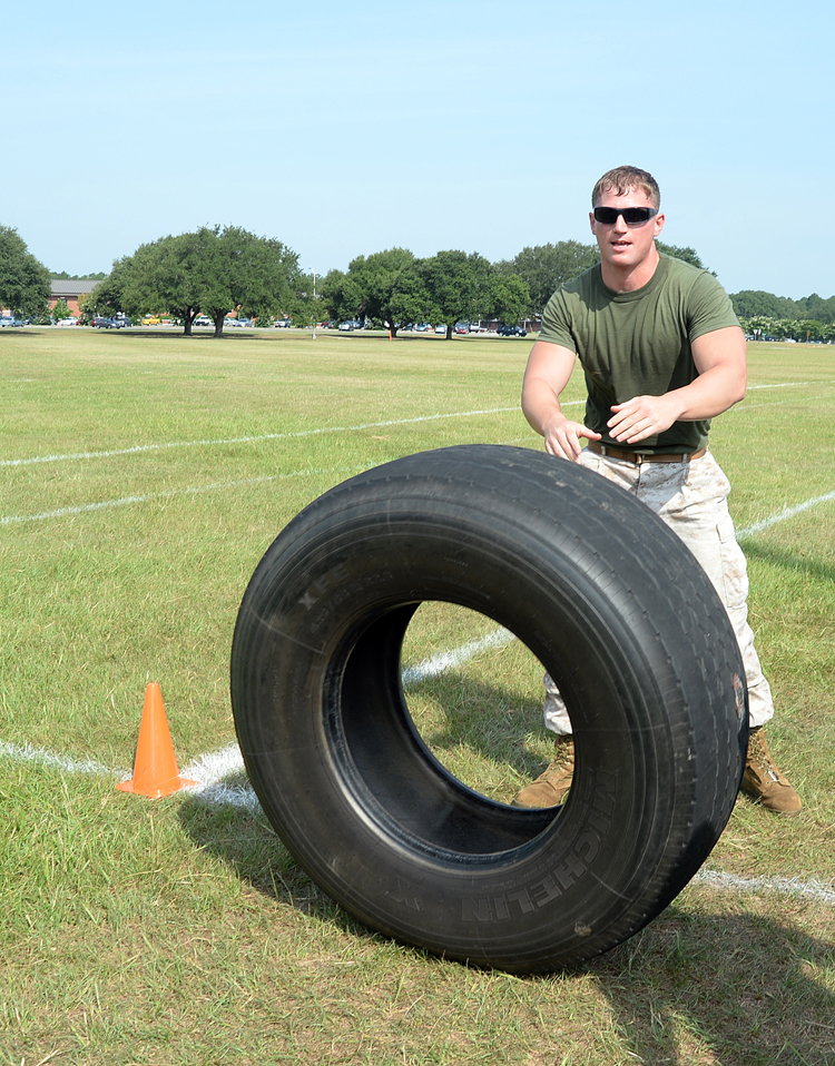 Marines test their resiliency during Marine Corps Logistics Base Albany's first High Intensity Tactical Training tactical athlete competition at Boyett Park here, July 14.
