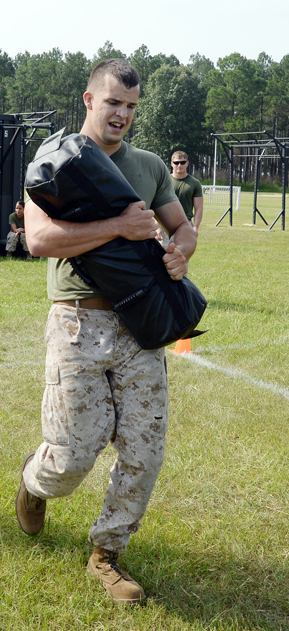Marines test their resiliency during Marine Corps Logistics Base Albany's first High Intensity Tactical Training tactical athlete competition at Boyett Park here, July 14.