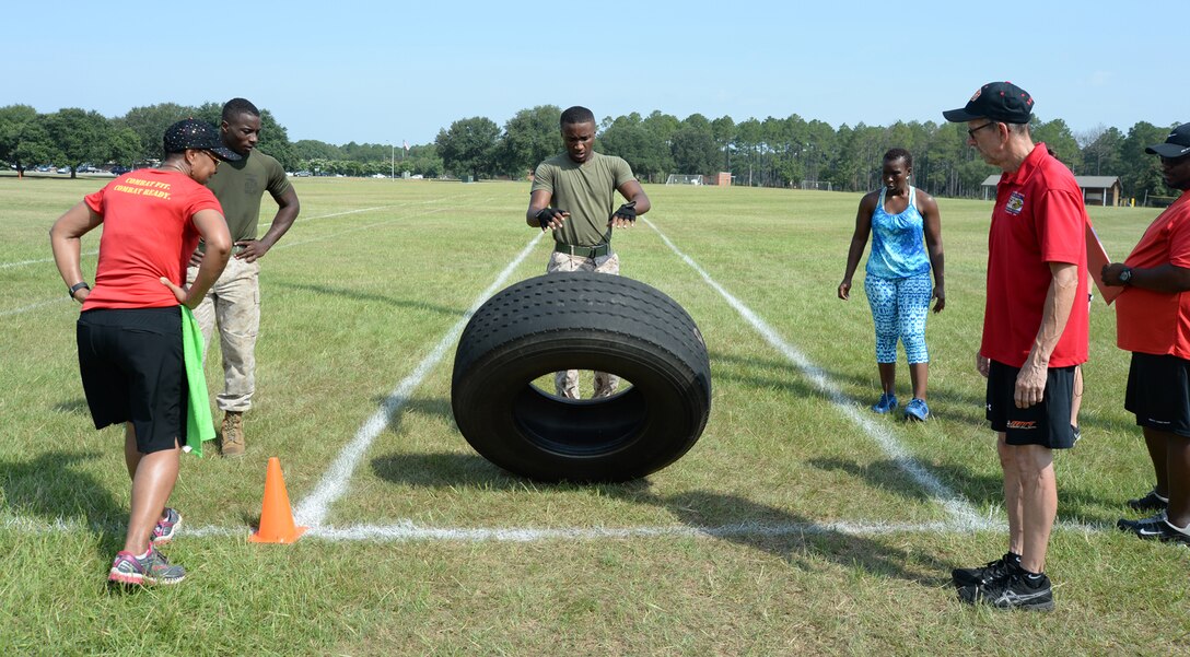 Marines test their resiliency during Marine Corps Logistics Base Albany's first High Intensity Tactical Training tactical athlete competition at Boyett Park here, July 14.