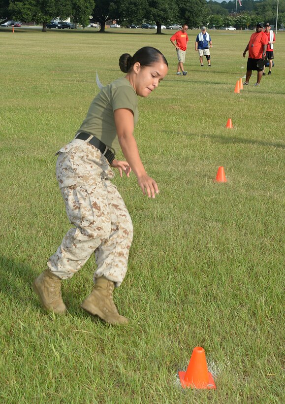 Marines test their resiliency during Marine Corps Logistics Base Albany's first High Intensity Tactical Training tactical athlete competition at Boyett Park here, July 14.