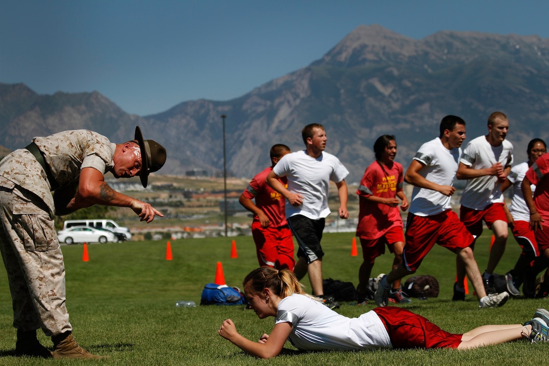 Drill instructors from Marine Corps Recruit Depots San Diego and Parris Island, S.C., and Marines from Marine Corps Recruiting Station Salt Lake City hosted poolees during RS SLC’s annual pool function at Camp Williams, Utah, June 26, 2015. During the event, Utah-based recruiters teamed with drill instructors to physically and mentally prepare enlistees for boot camp. The enlistees, part of the Marine Corps delayed entry program, are waiting to ship to boot camp. (U.S. Marine Corps photos by Sgt. Daniel Wetzel)