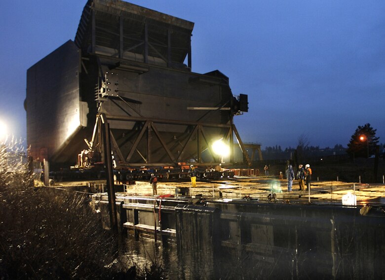 Workers at Swan Island near Portland, Ore., prepare the spillway weir Feb. 16 for movement up the lower Columbia River to Ice Harbor Lock and Dam on the lower Snake River. It took three days to transport the five-story-tall, 1.7 million-pound fish passage structure.