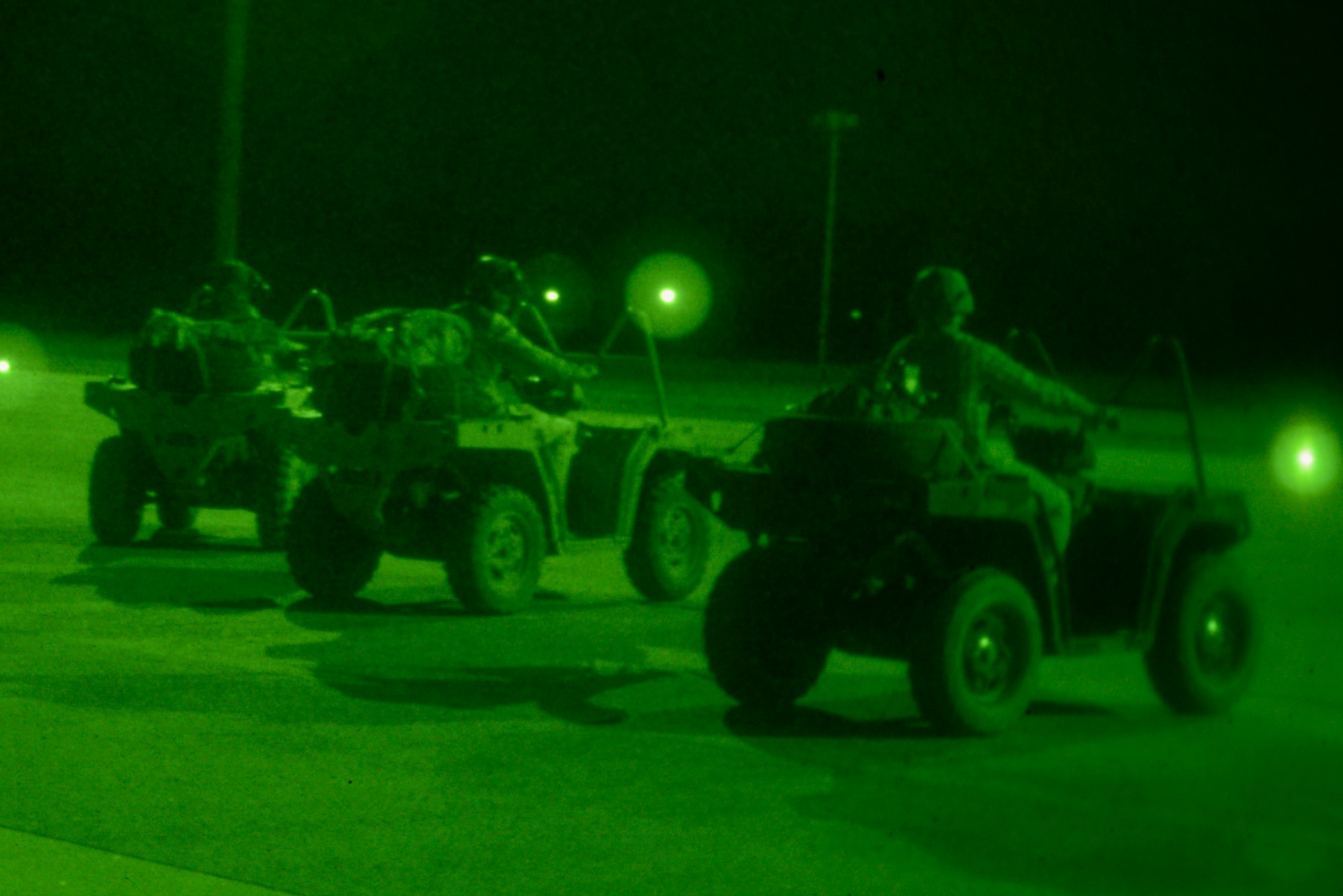 Members of the U.S. Army 1st Battalion, 1st Special Forces Group, practice a rapid infiltration of a flight line with the help of U.S. Air Force 1st Special Operations Squadron loadmasters during exercise Talisman Sabre the Northern Territory of Australia, June 30, 2015. Exercises like Talisman Sabre provide effective and intense training to ensure our forces are capable, interoperable and deployable on short notice. (U.S. Air Force photo by Senior Airman Stephen G. Eigel)