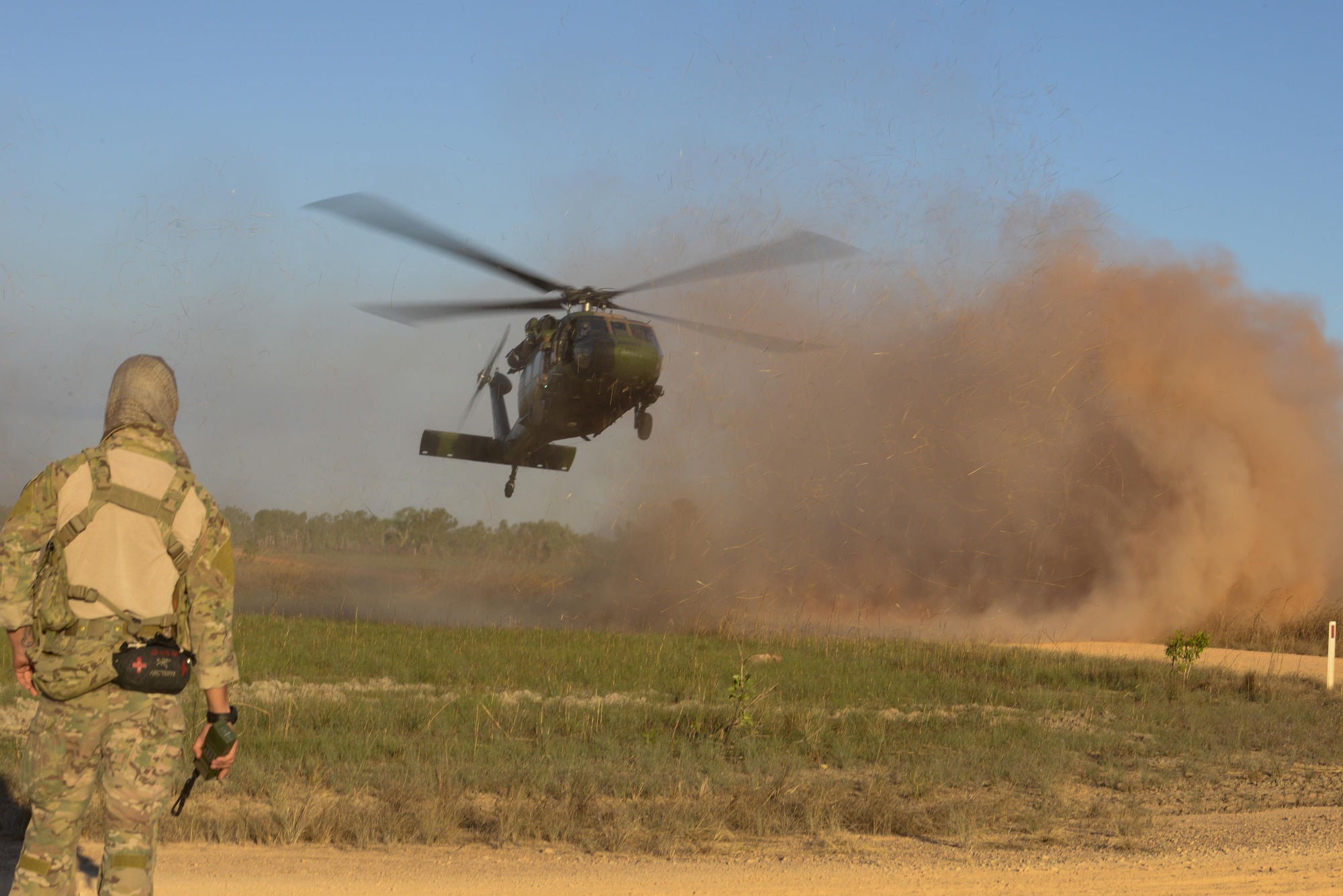 An Australian army S-70A Black Hawk begins its landing during exercise Talisman Sabre in the Northern Territory of Australia June 29, 2015. Exercises such as Talisman Sabre 2015 provide realistic, relevant training which is necessary to maintain regional security, peace and stability. (U.S. Air Force photo by Senior Airman Stephen G. Eigel)
