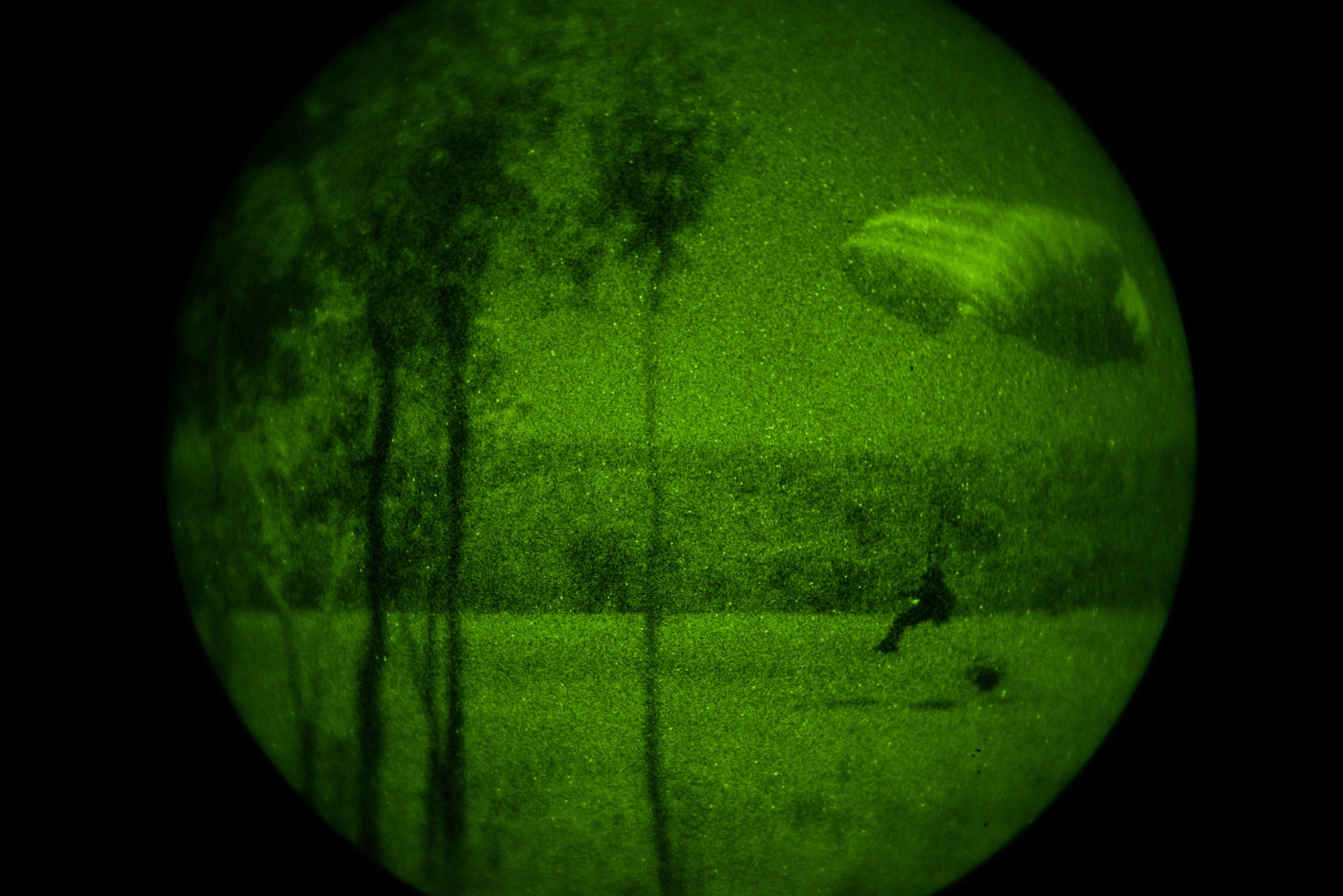 A member of the Australian army 2nd Commando Regiment lands after jumping from an MC-130H Combat Talon II from the 1st Special Operations Squadron during exercise Talisman Sabre in the Northern Territory of Australia, June 29, 2015. Exercises like Talisman Sabre provide effective and intense training to ensure our forces are capable, interoperable, and deployable on short notice. (U.S. Air Force photo by Senior Airman Stephen G. Eigel)