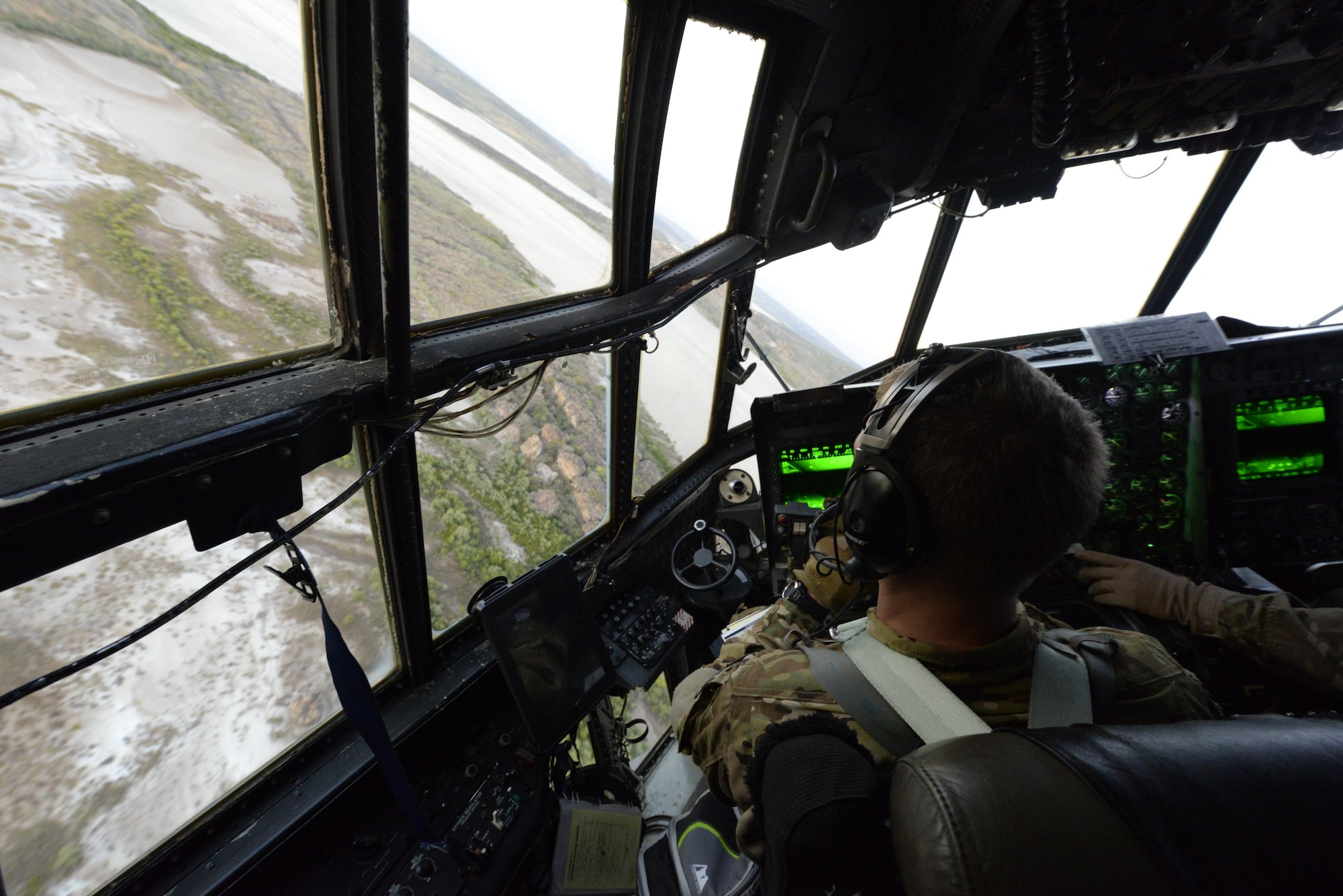 U.S. Air Force Maj. Mathew Nevius, 1st Special Operations Squadron pilot, performs low-level maneuvers in an MC-130H Combat Talon II during exercise Talisman Sabre in Northern Territory, Australia, July 2, 2015. Exercises such as Talisman Sabre 2015 provide realistic, relevant training which is necessary to maintain regional security, peace and stability.  (U.S. Air Force photo by Senior Airman Stephen G. Eigel)